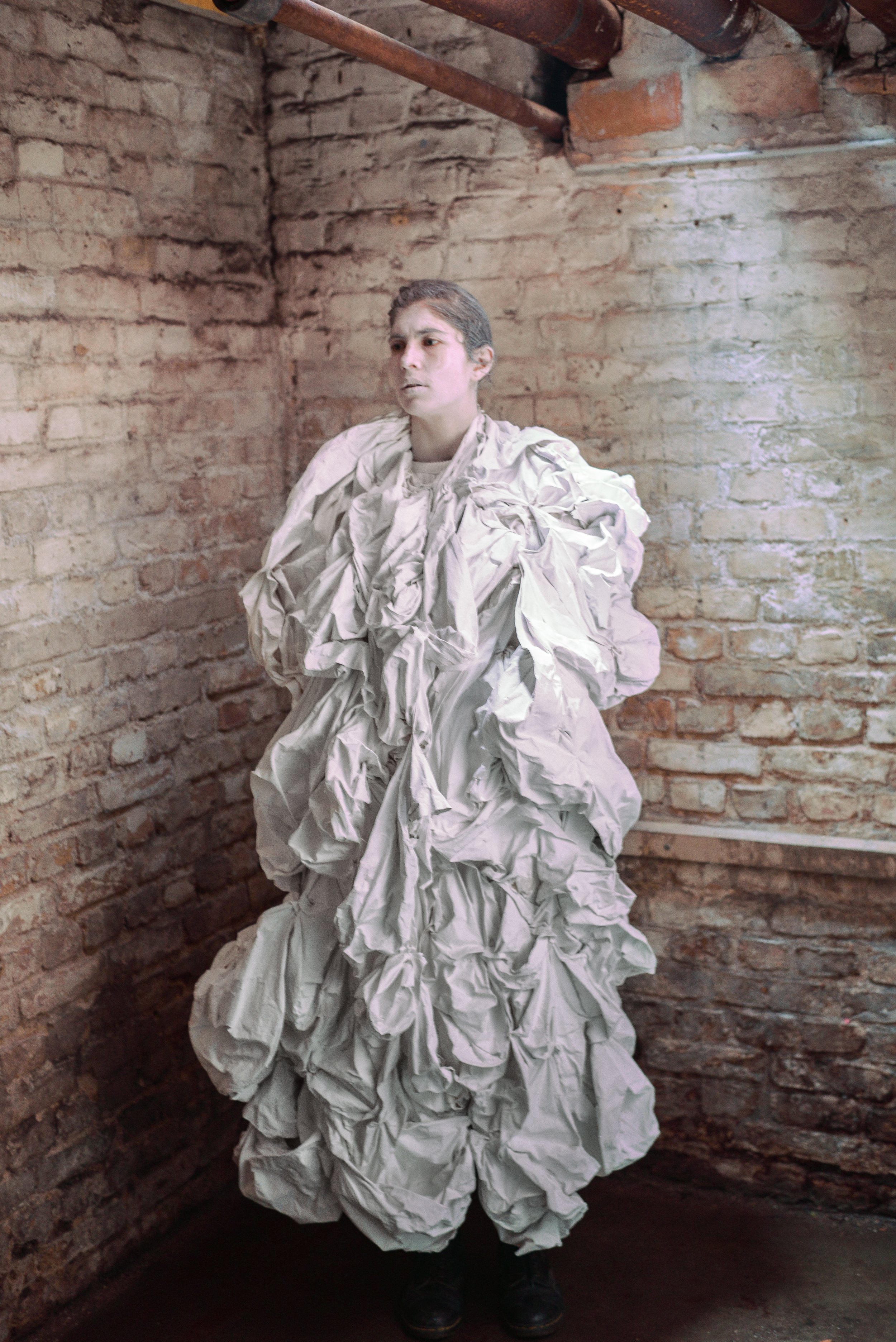   performative sculpture - walking  (2018)  costume in rough cotton painted white, in collaboration with performer Zoe goldstein. 