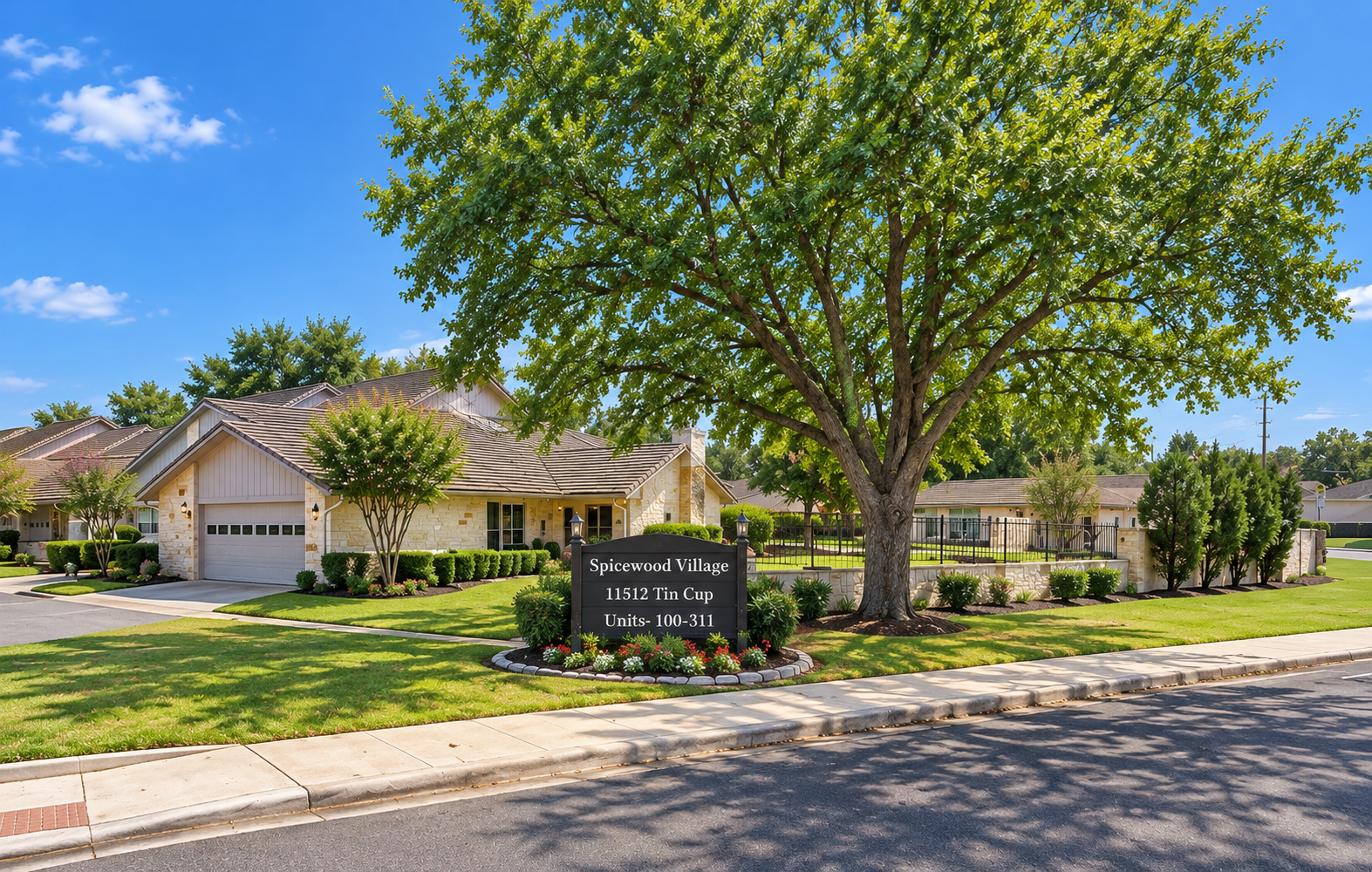 Spicewood Village Entrance on a Sunny Day.png