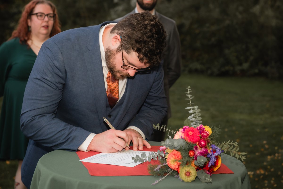 brittney.corey.photography-wedding-certificate-signing-13.jpg