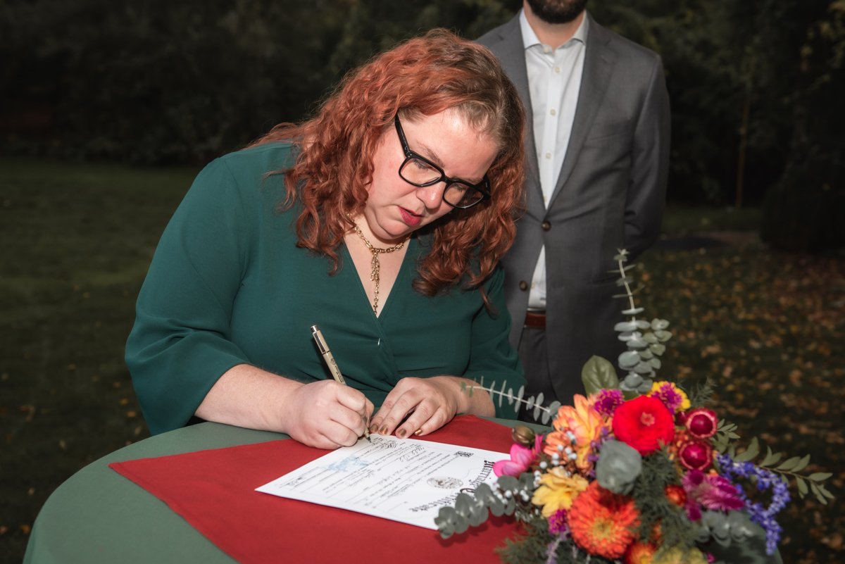 brittney.corey.photography-wedding-certificate-signing-26.jpg