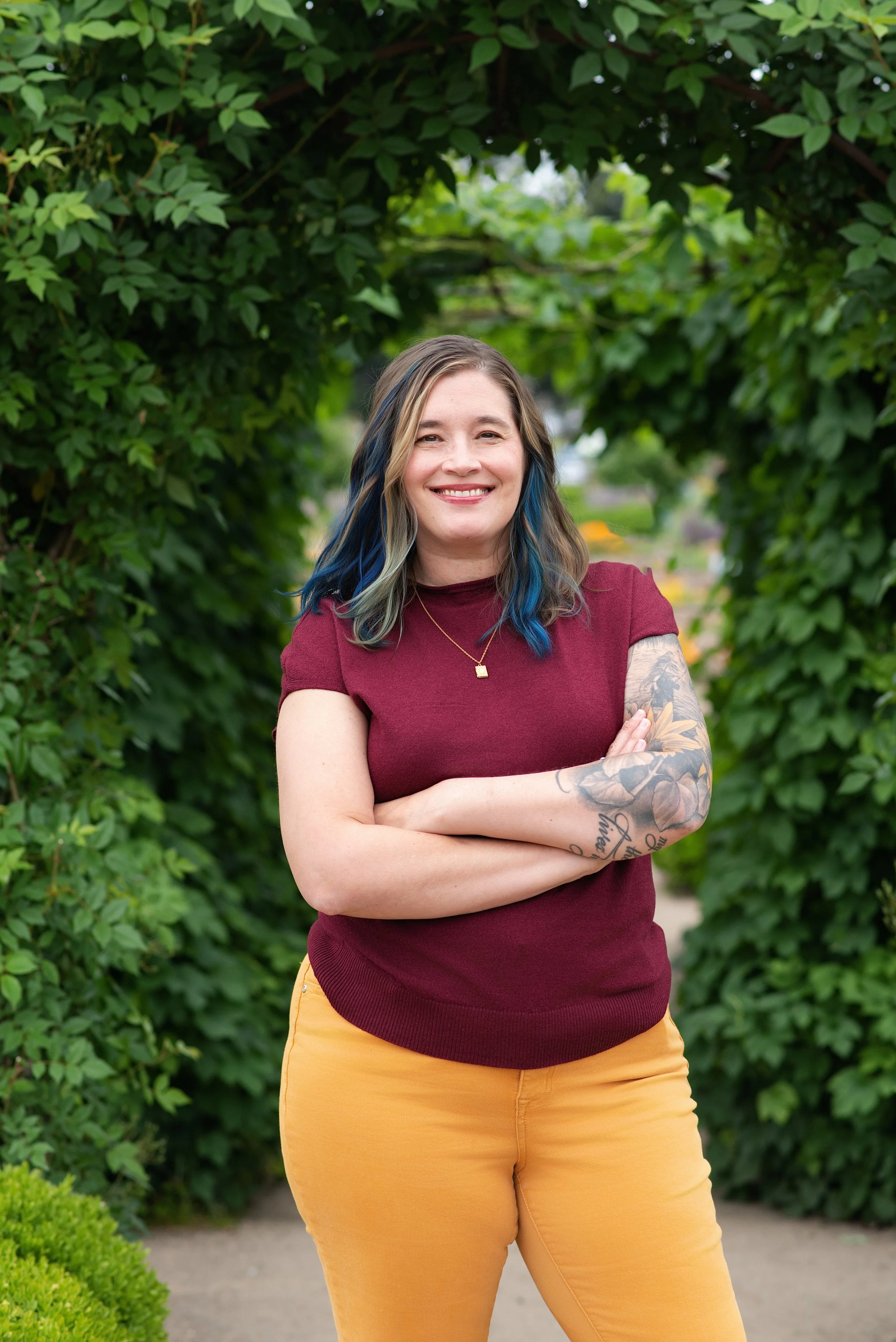  Outdoor headshot of a mental health professional at the Fort Vancouver gardens in Vancouver, Washington. 