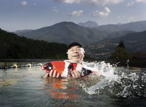 Joseph Zuritsky with Koi Fish. Credit: Michael Cogliantry