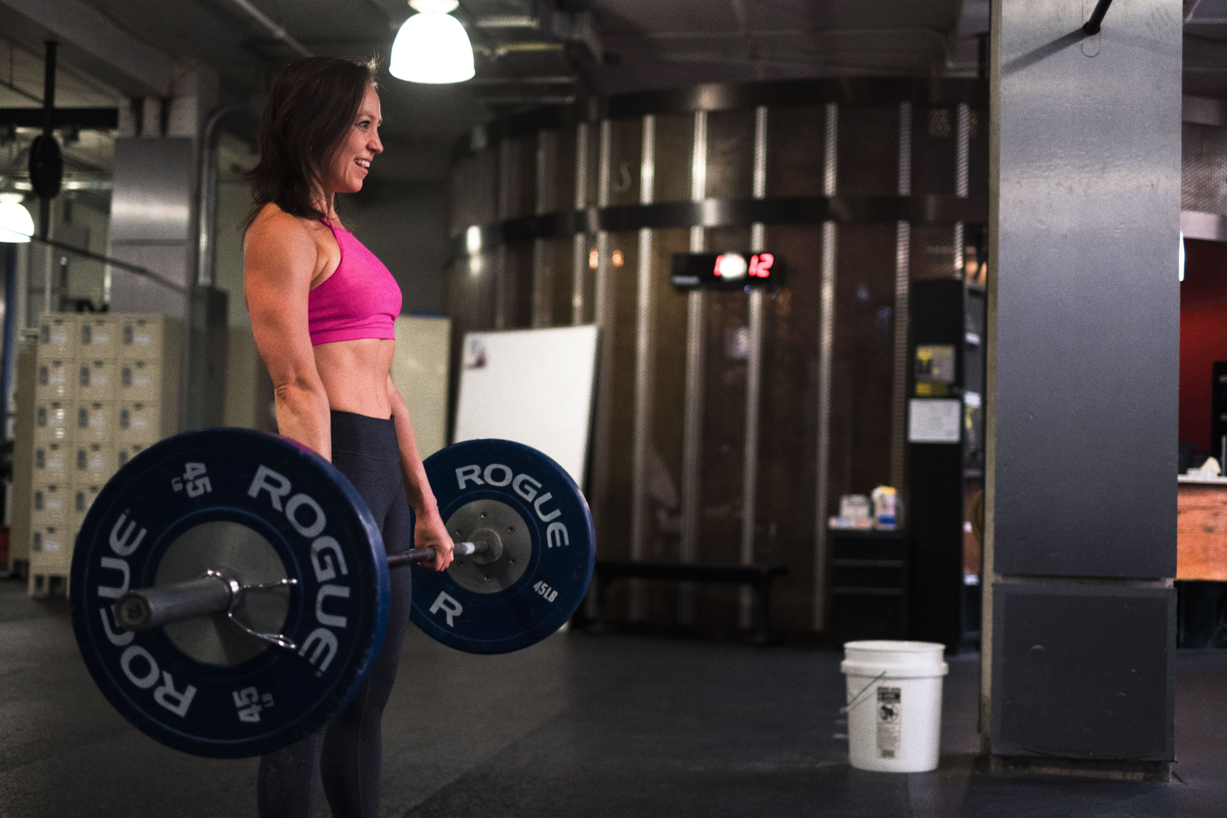 Topless girls weightlifting