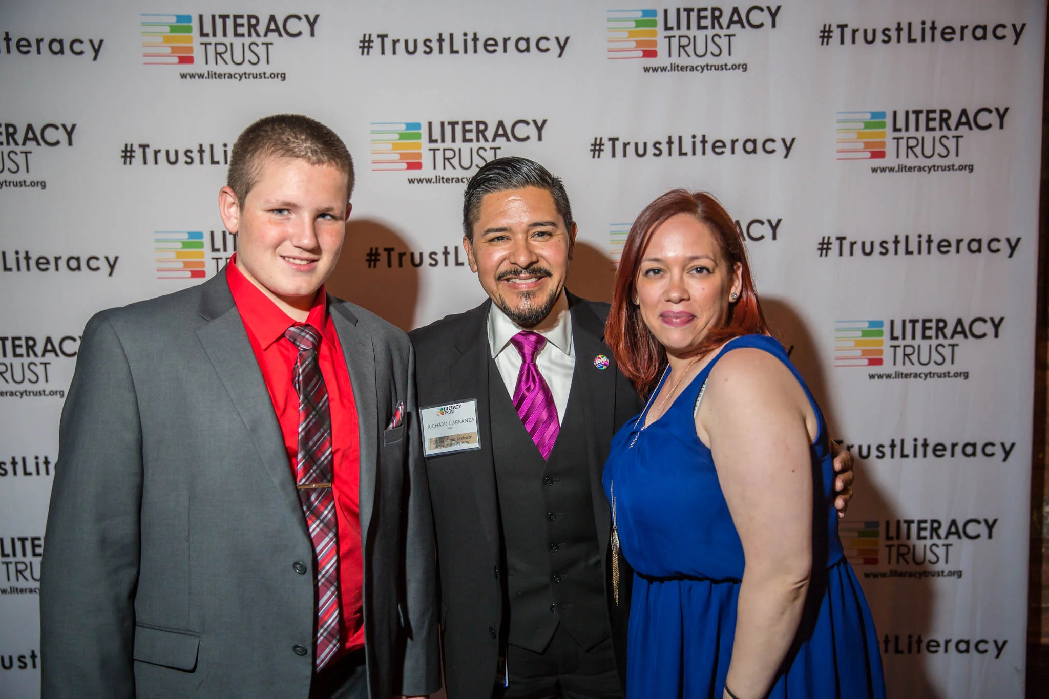 Student speaker Brady from HCCS, Chancellor Carranza, and Brady’s instructor from years ago, Xiomara Turull