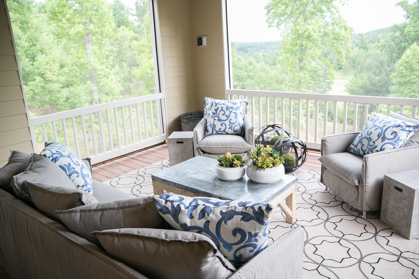 Screened porch creates perfect outdoor den with big mountain & golf views