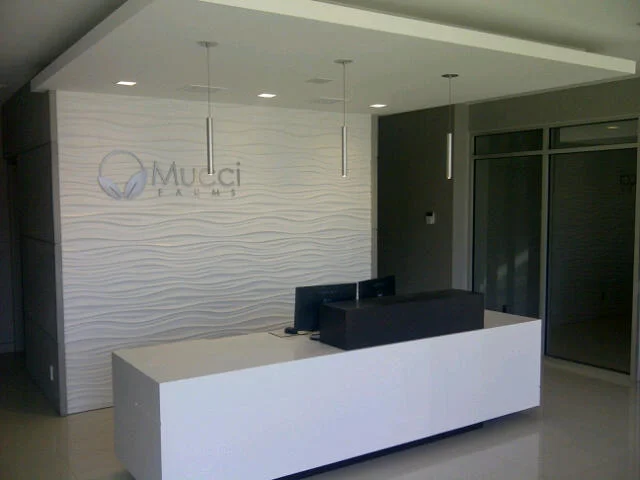 Office reception desk wave wall tile white quartz counter ideas inspiration.jpg