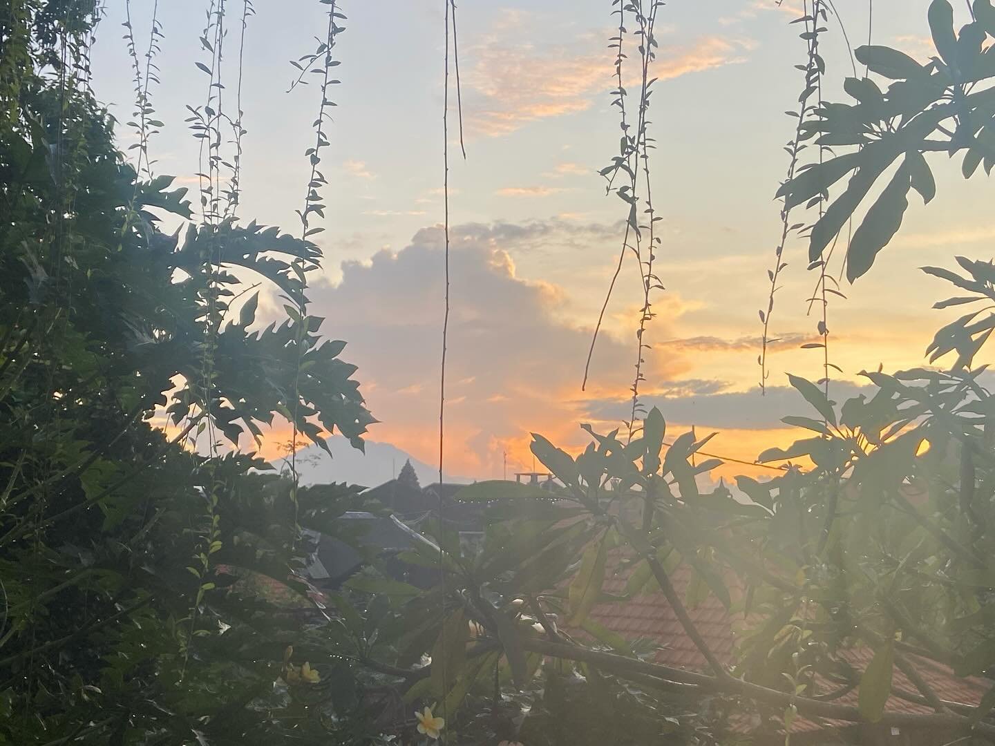 Fell asleep last after an unexpected epic gamelan &ldquo;concert&rdquo; at the community area right next door to my room and I woke to this sunrise this morning and a view of the volcano! And that was without any filters! Amazing. When I am just quie