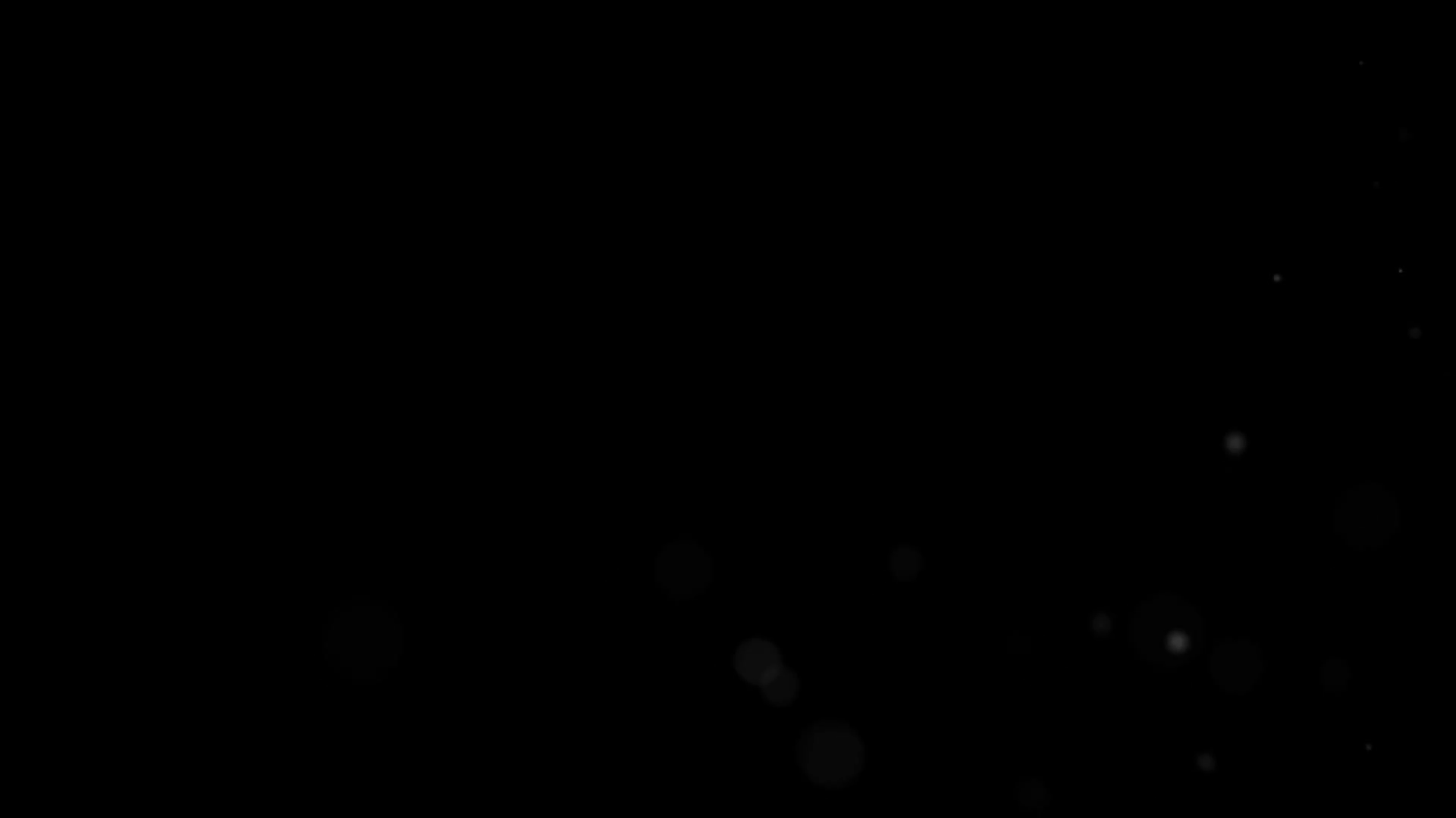 videoblocks-animation-dust-particles-on-a-black-background-4k_s7fw8itm5l_thumbnail-full01.png