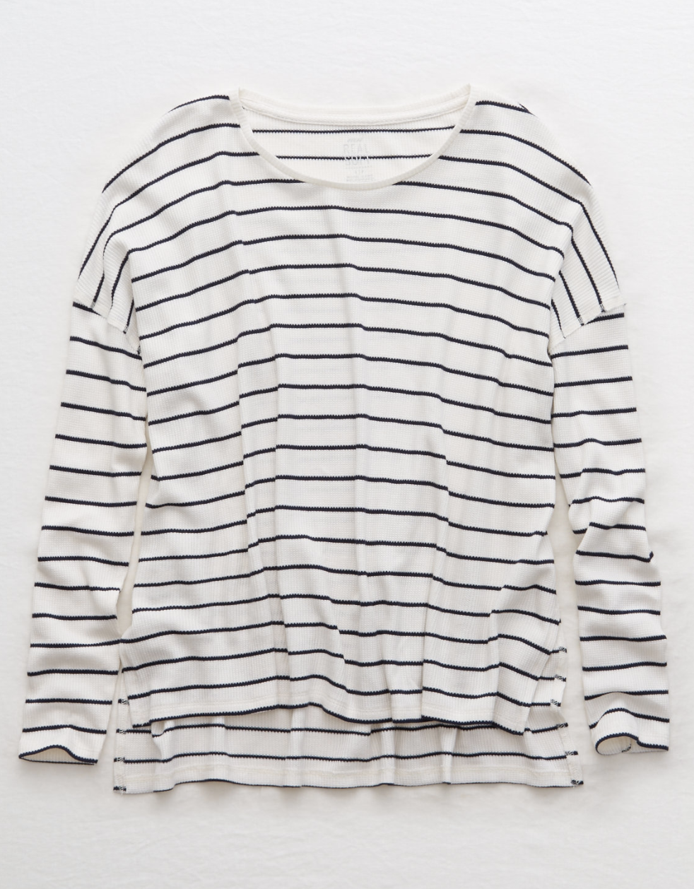 4. Aerie Waffle Dolman Tee , Aerie: I literally live for comfortable athleisure wear. When I was little, I was hyper-sensitive to textures and used to have my mom cut out all of the tags on my clothes (no lie, I could not relax when I could feel any scratchy tags #crazychild) . Even today, finding clothes that I’m comfortable wearing is no easy feat. Oddly enough, an old high school favorite, Aerie, has become one of my new go-to’s for comfy basics. I have an entire wardrobe of stripes and neutrals, and could live in this lightweight long-sleeve.