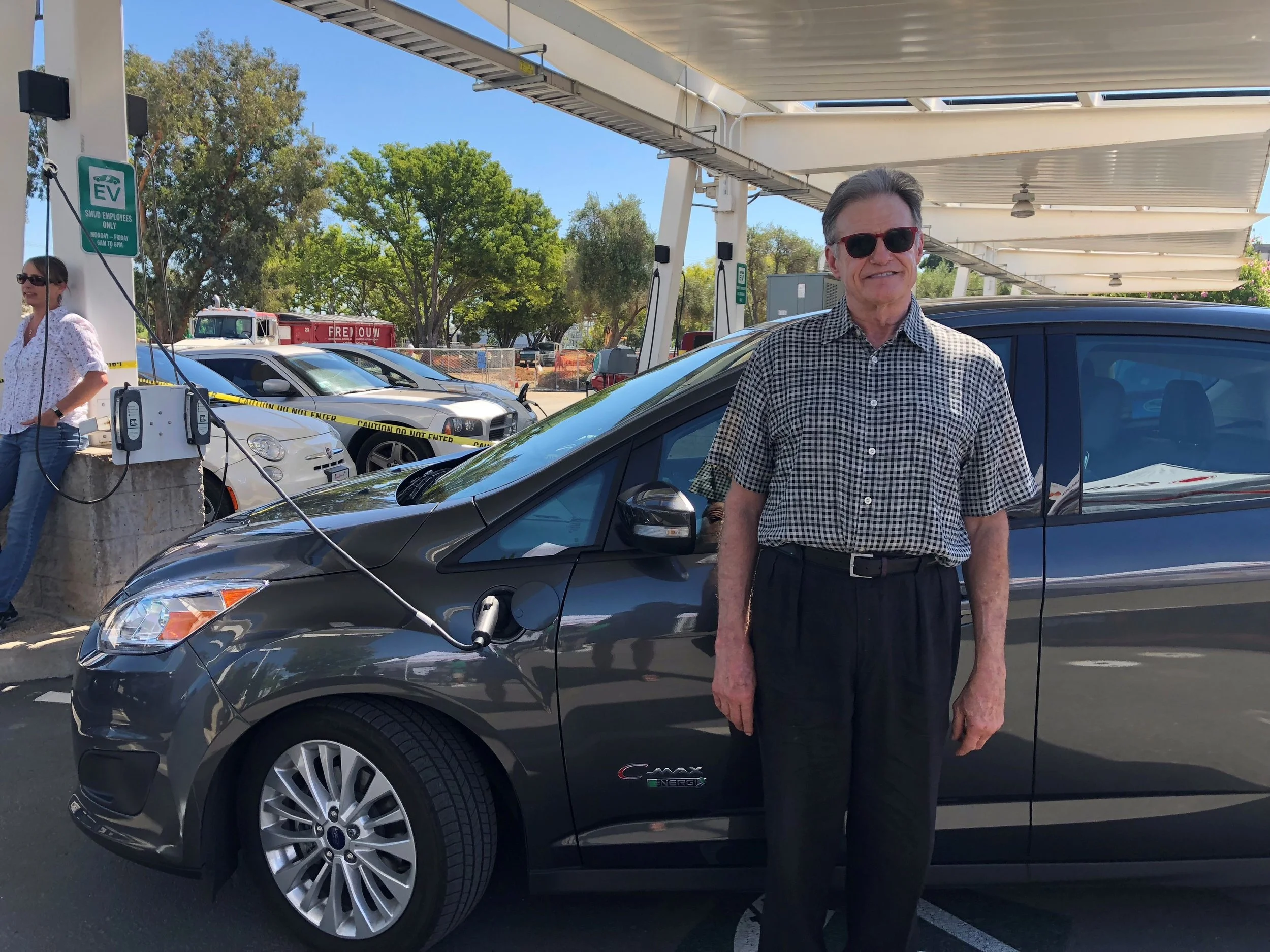 "Everyone who gets in my car wants to know all about it," says Uber driver James Ashcraft, shown here with his Ford CMax.