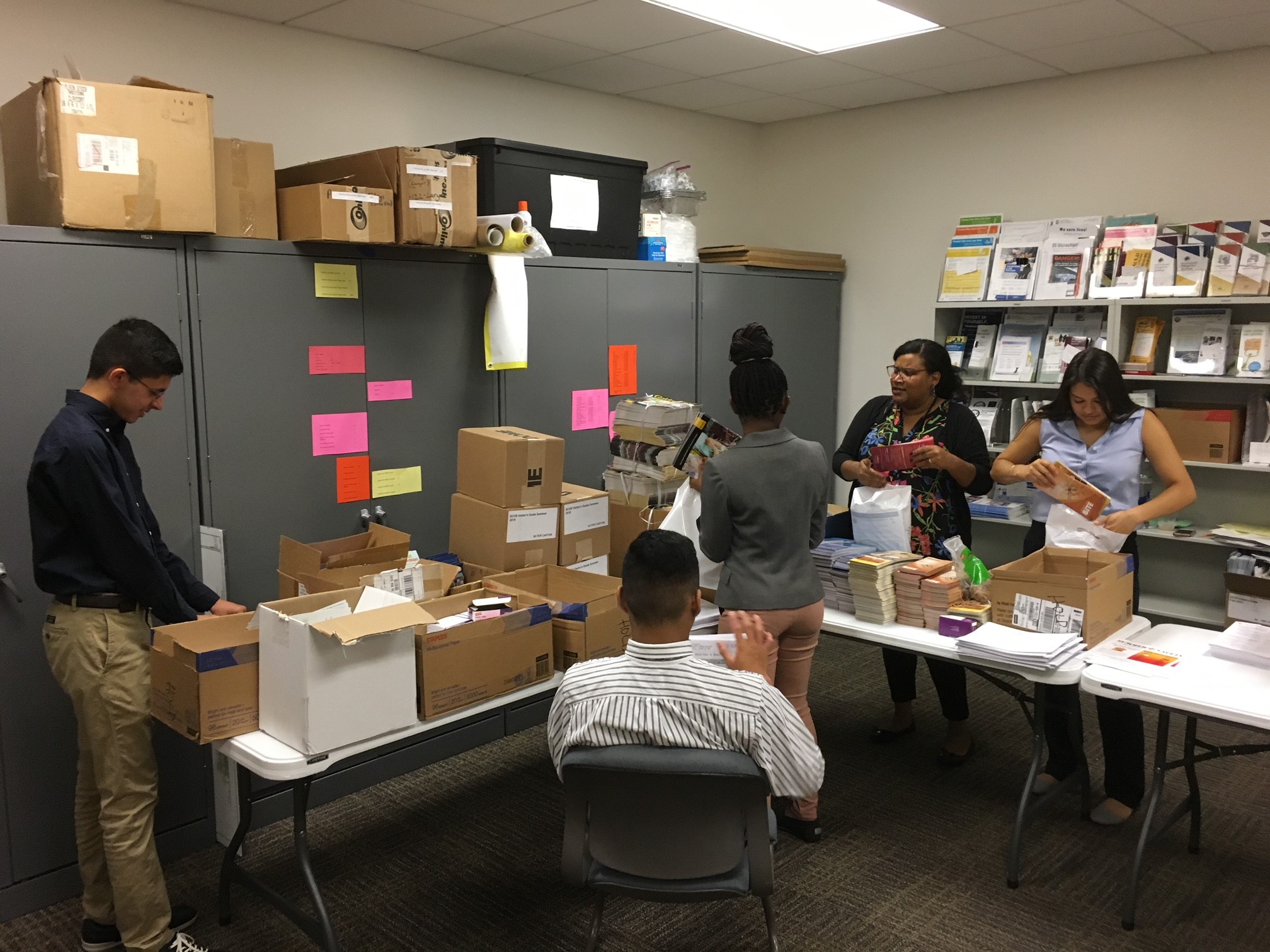 Interns from the Mayor's Office help out with a job for the City's Department of Youth, Parks & Community Enrichment.