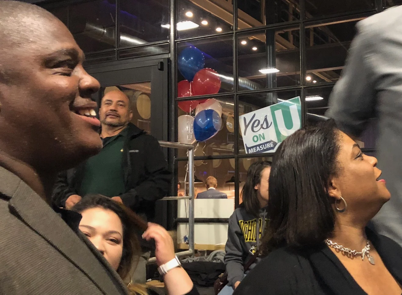 Supporters of Measure U celebrate the news that it passed