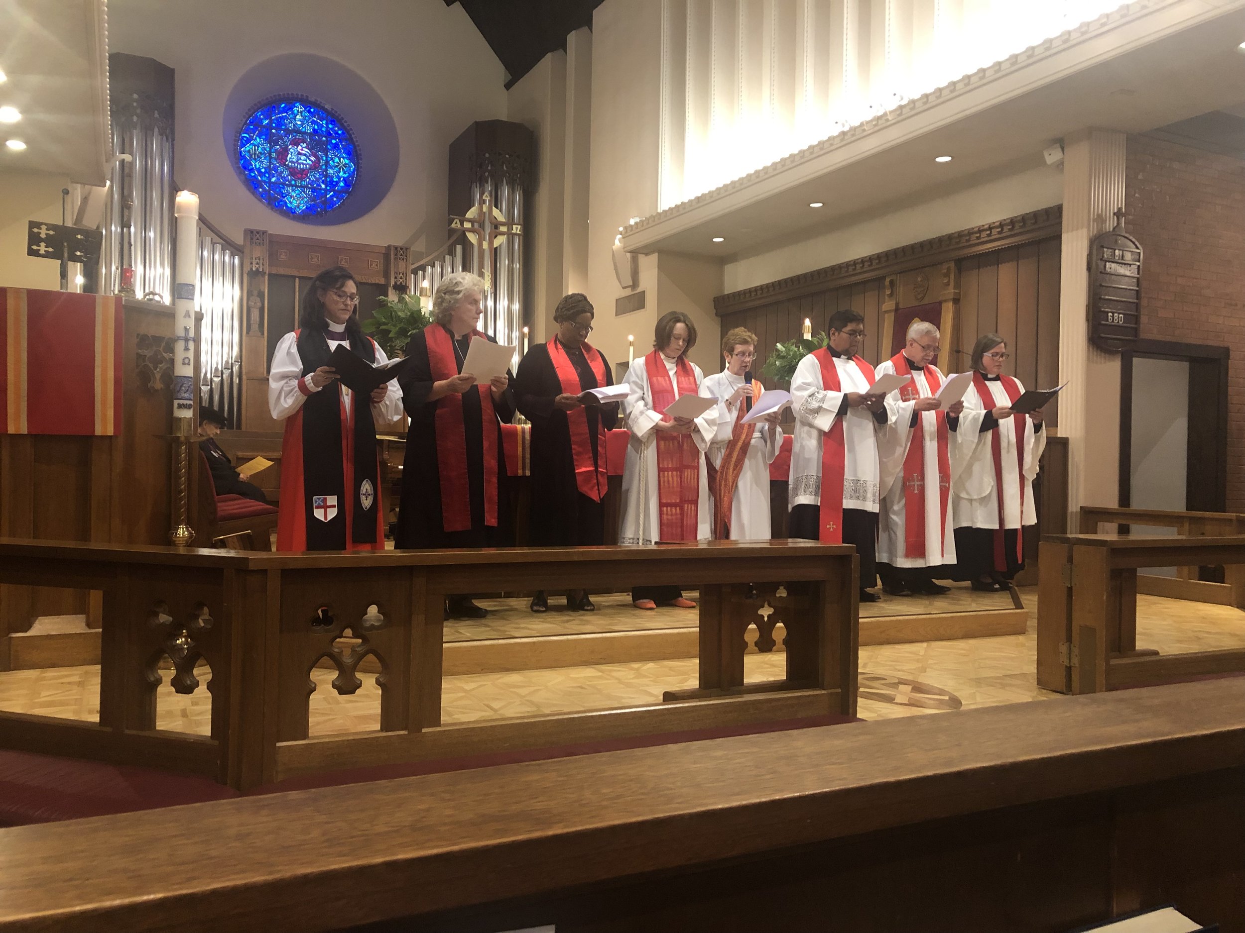 Clergy members perform a liturgy for victims of mass shootings in the United States