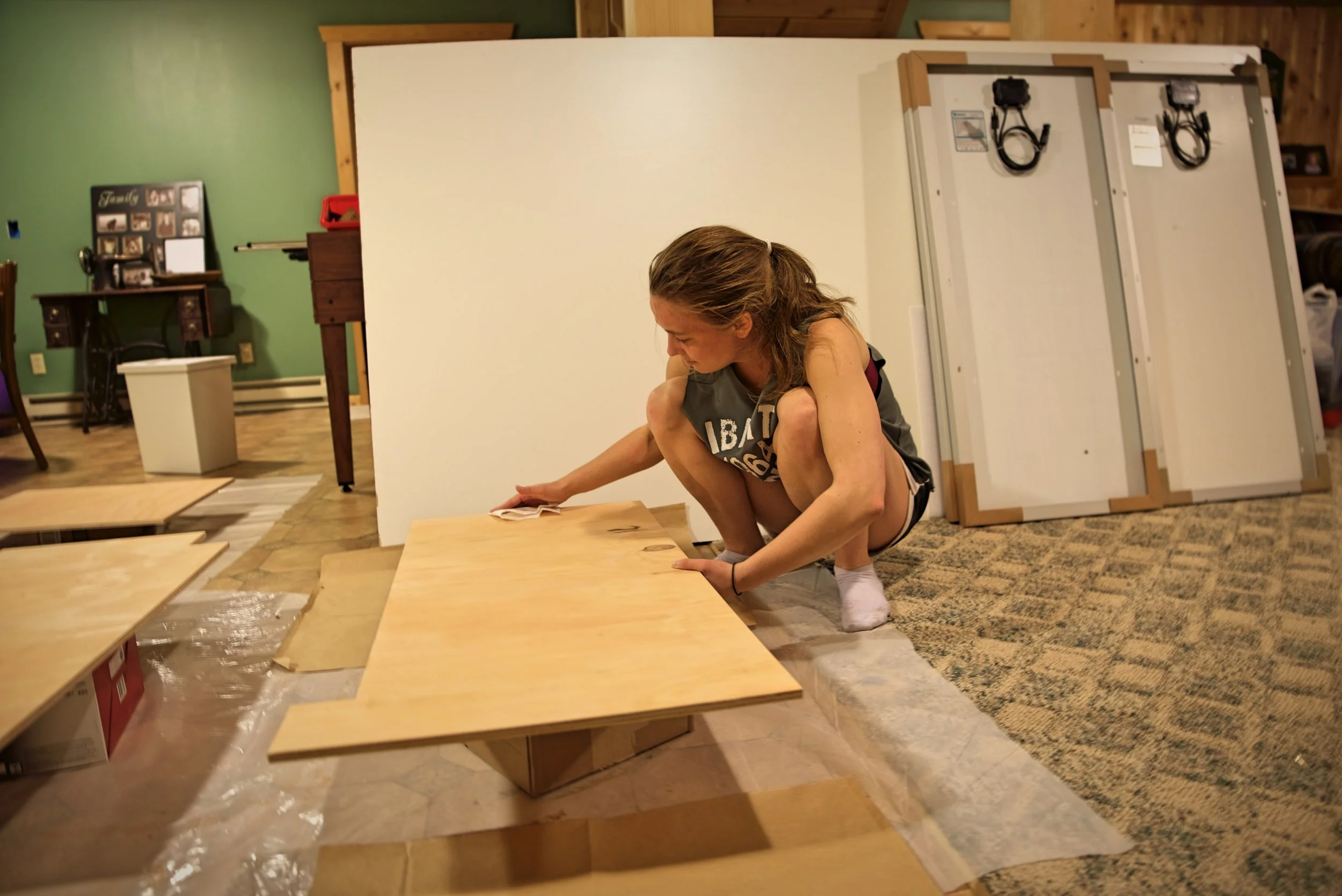 Sanding between layers helps the finish to penetrate and adhere better. Make sure to wipe the dust off though or it will affect the finish.