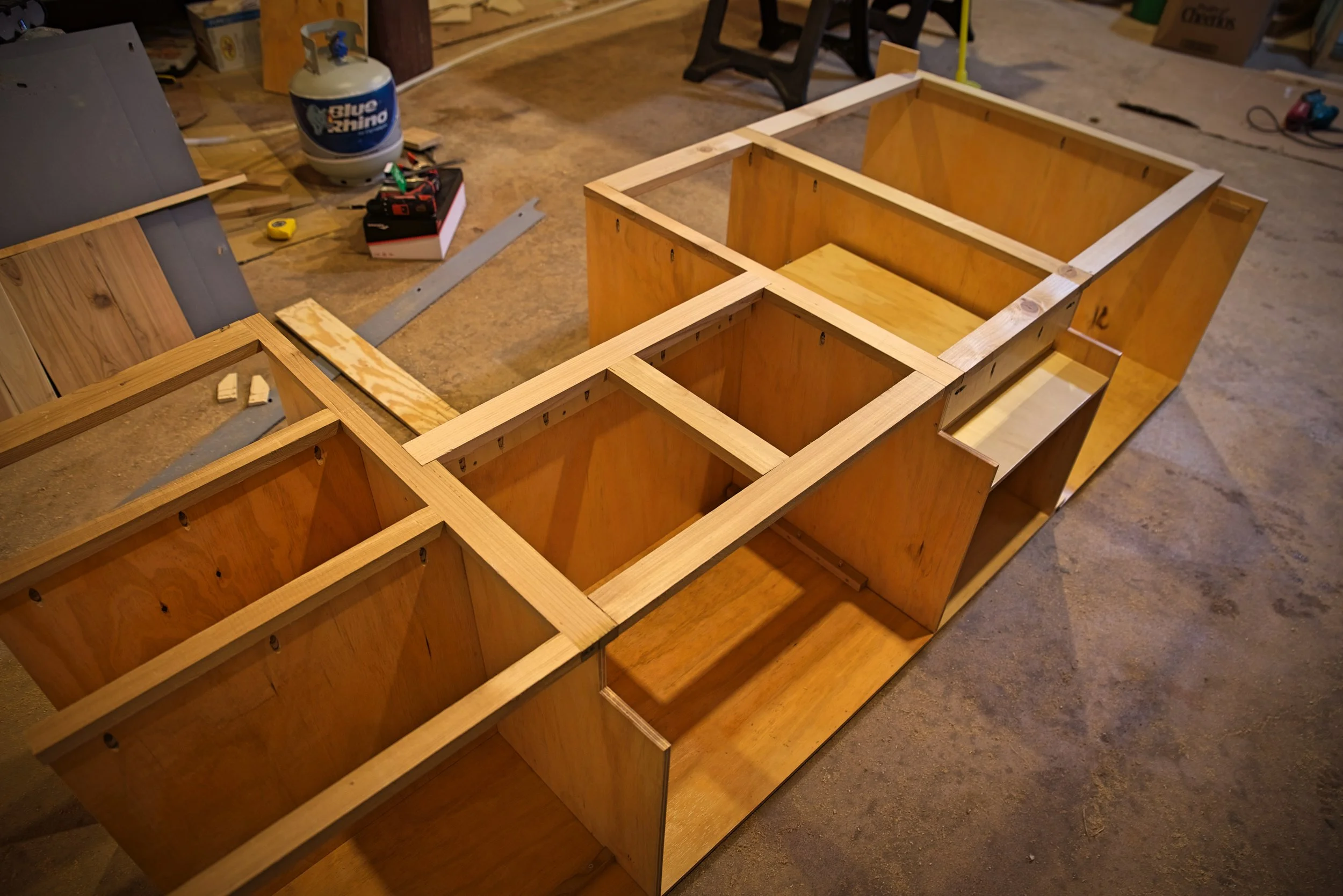 Eventually the frame would be joined to the cabinet cases using the pre-drilled pocket holes you can see all over this photo.