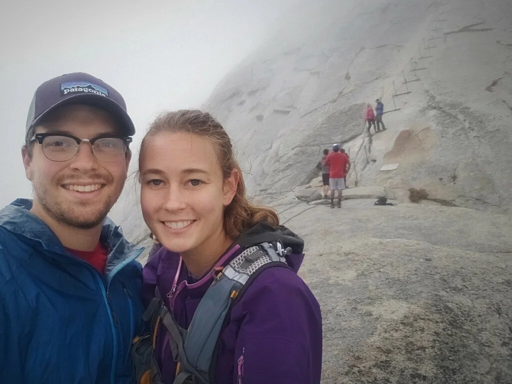 We accidentally captured a marriage proposal happening on the cables in the background of our selfie.