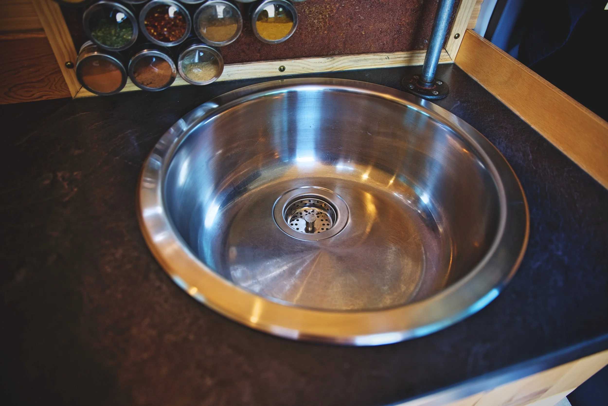 We like our sink because it is wide and deep enough for doing all the dishes we have in the van.