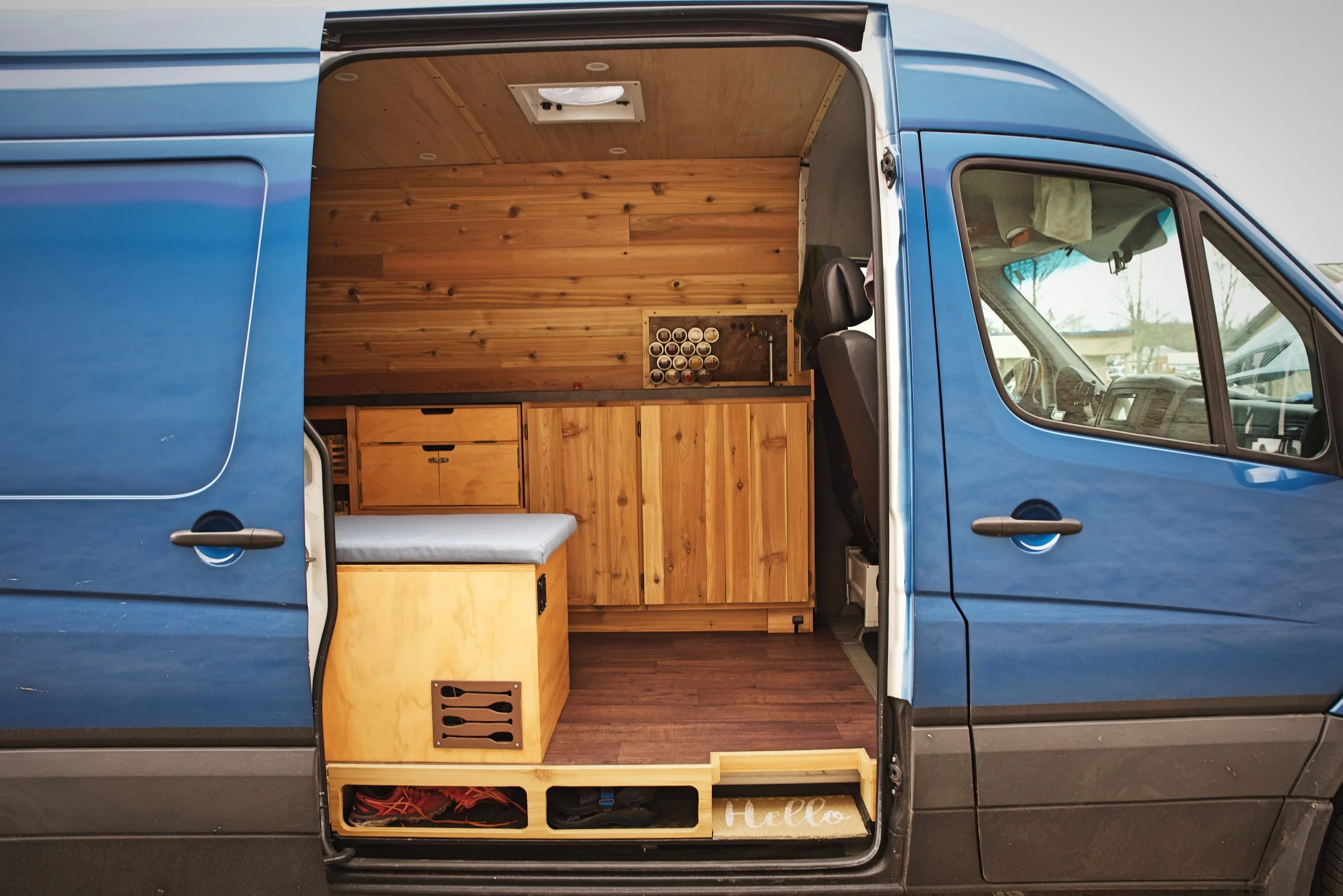 The cabinets fit with the style of the van. Because of the extra time we took in the design stage, we also have really useful areas for storage and cooking.