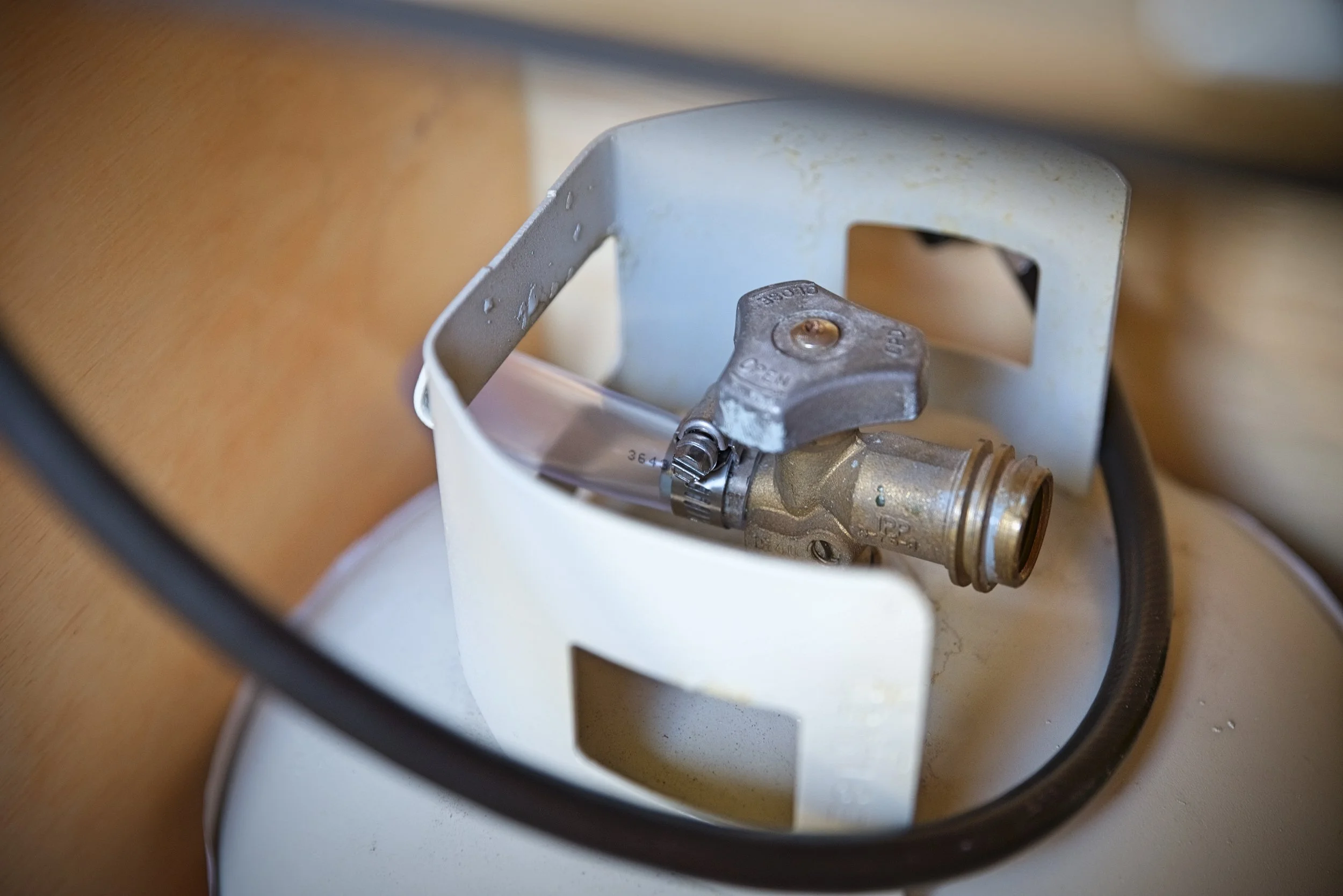 All modern propane tanks have an over-pressure relief valve on the back side of the hose valve.