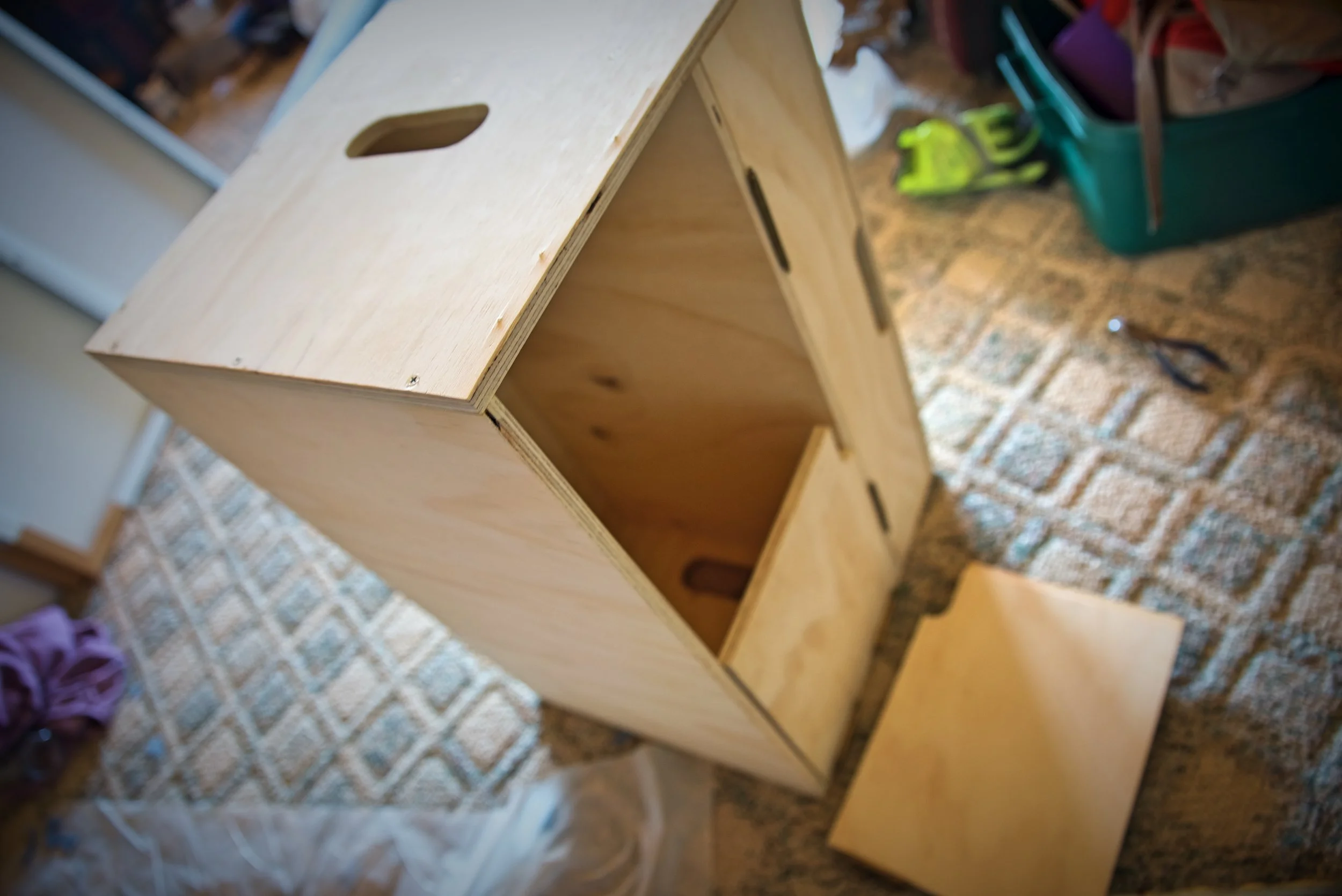 The screws that came with the hinges were a tiny bit too long, and they poked through the plywood.