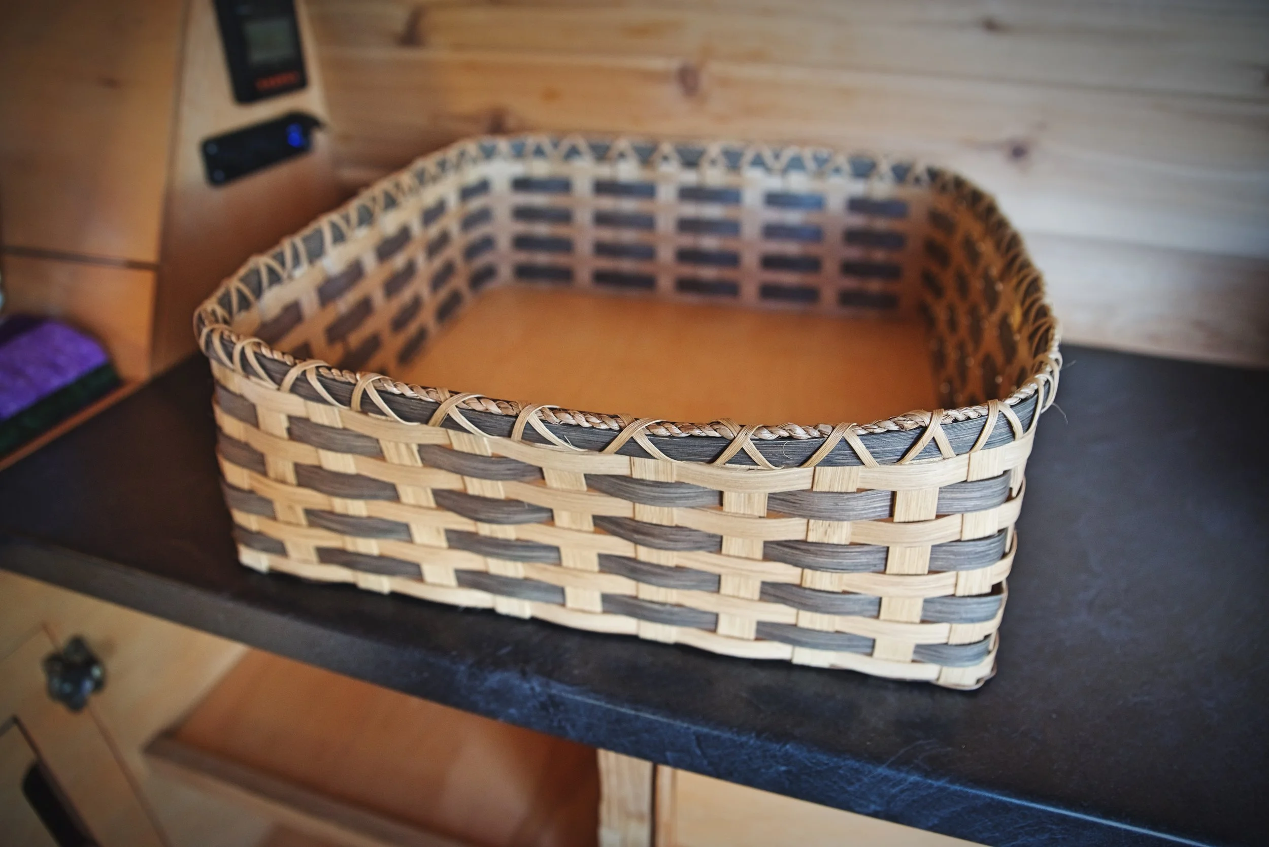 We keep utensils and dry foods in these baskets. The bottom is reinforced with a piece of 1/4-inch plywood.