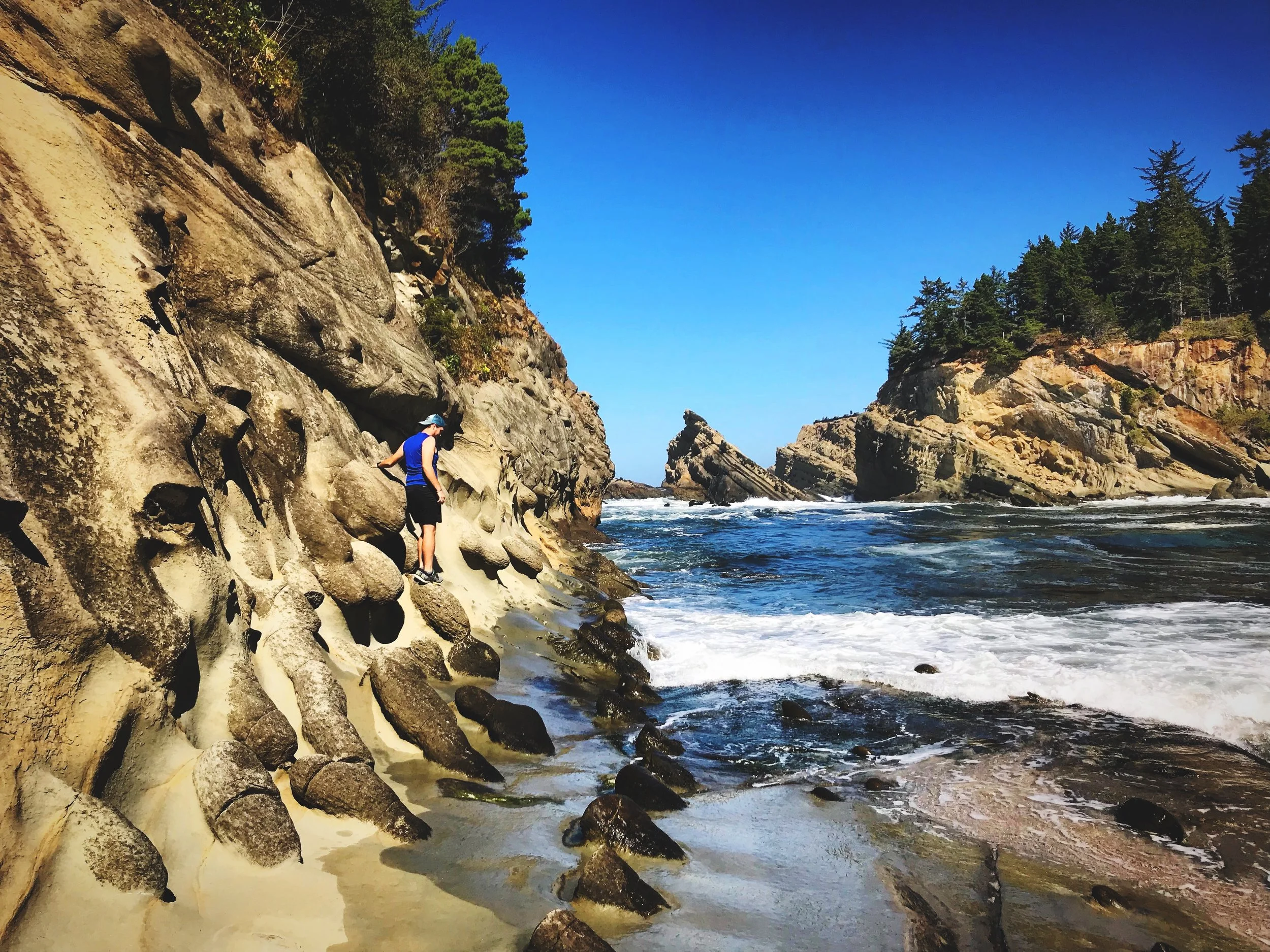 Ian couldn’t resist climbing on these blobby rocks.