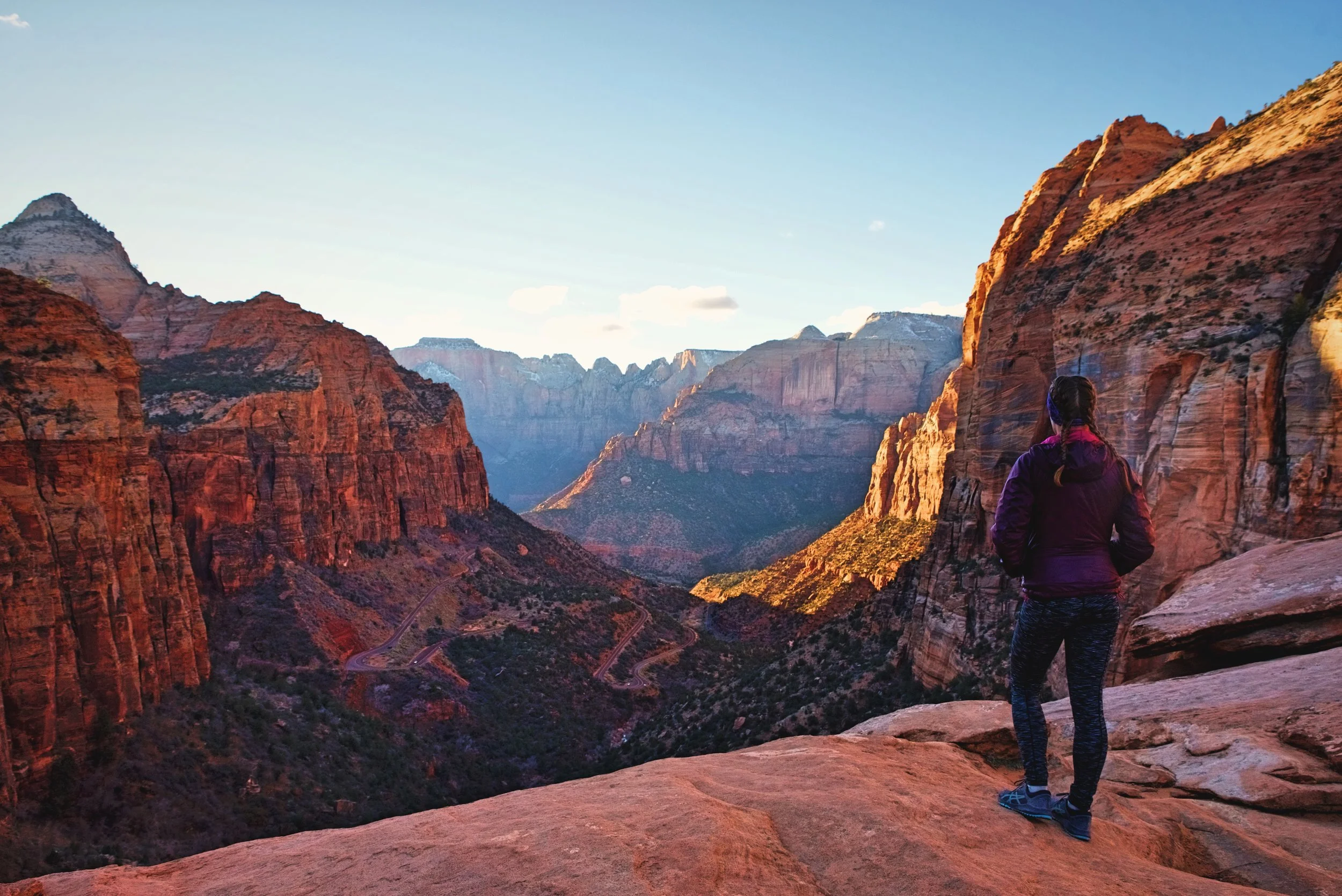 The view from the end of the Canyon Overlook Trail is amazing in the evening when the light is low. You can see the Zion-Mount Carmel Highway and the “windows” where the tunnel goes through the mountain to the left.