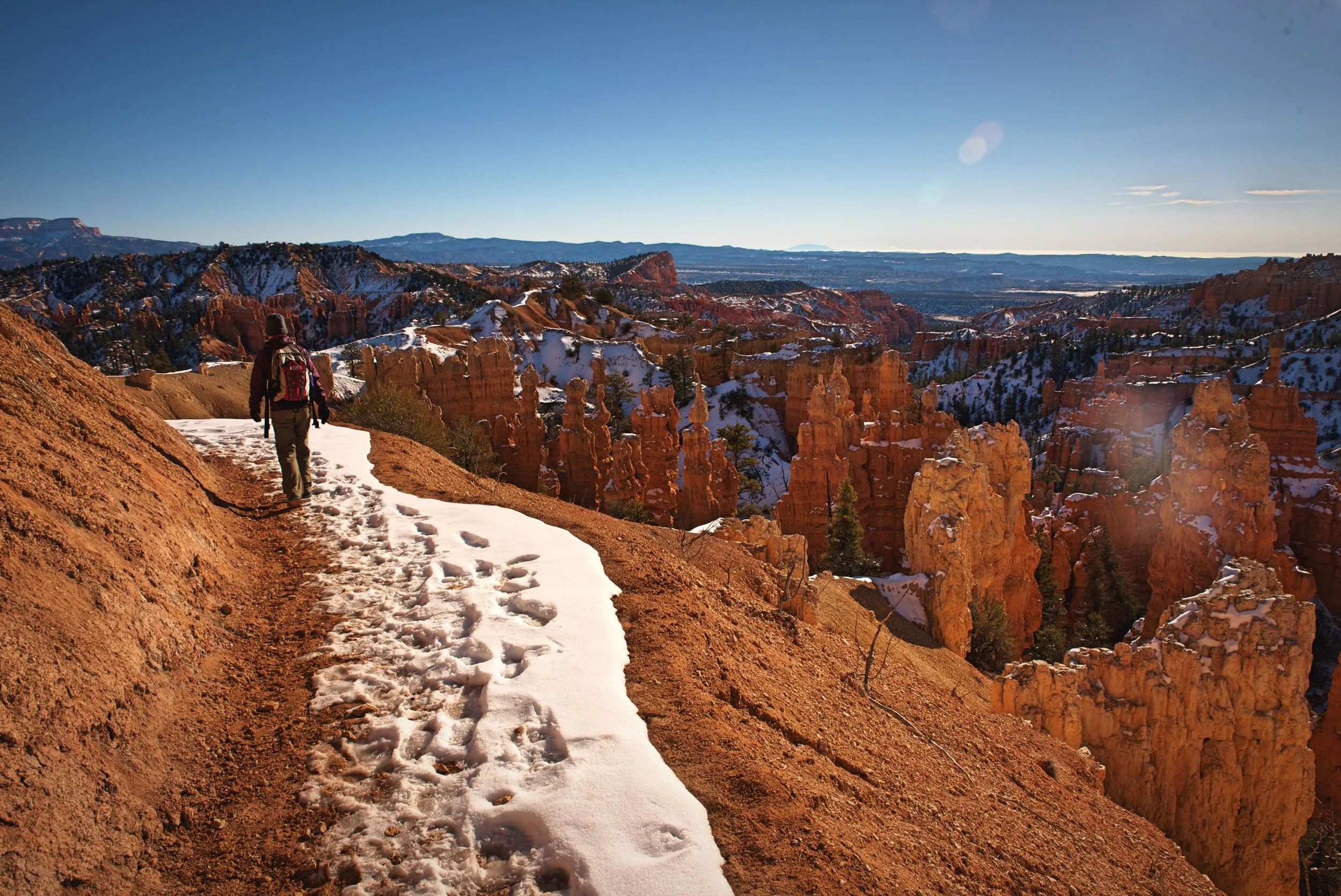 You descend into Bryce Canyon at Fairyland Point. This portion of the trail is a ledge with a sloped drop off next to it.