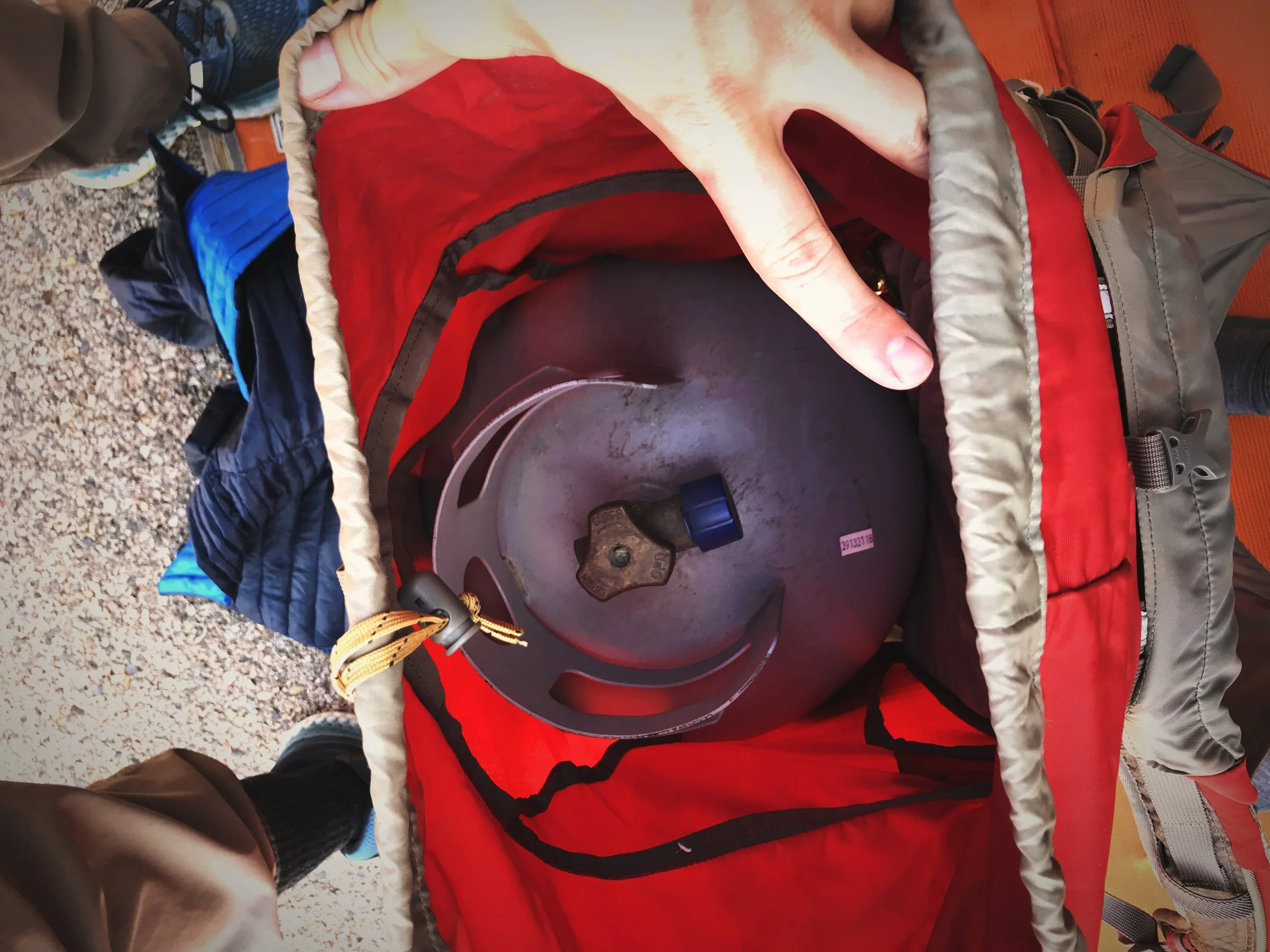 Ian had to bike to a gas station to exchange our propane tank. He put the tank in my backpacking backpack so he could carry it. The store clerk must have been so confused.