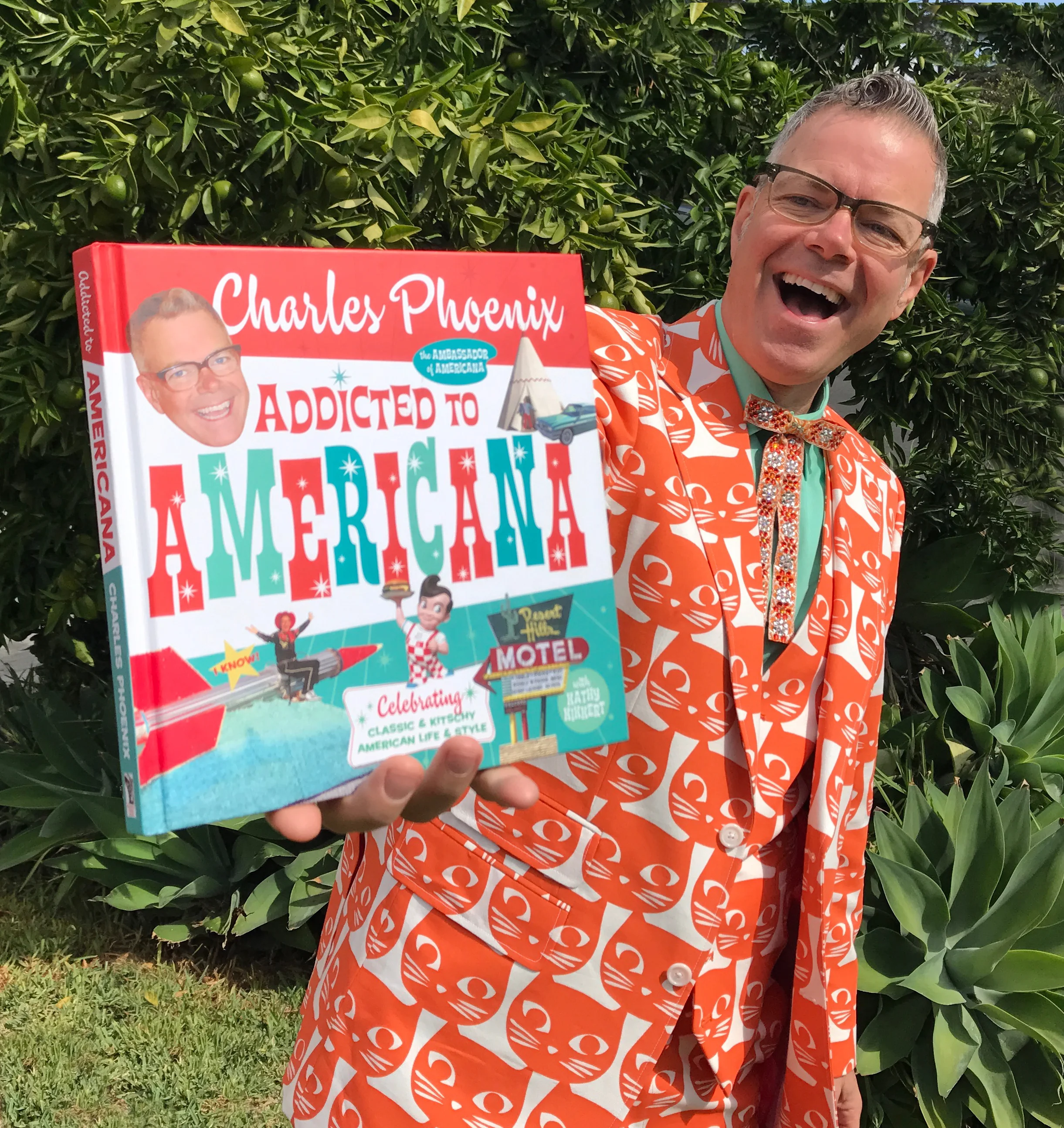 Ambassodor of Americana Charles Phoenix with his latest coffee table book, Addicted to Americana.jpg