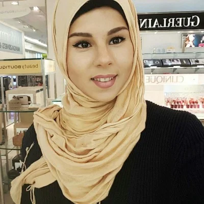 Dina (Former Iraqi Refugee) 