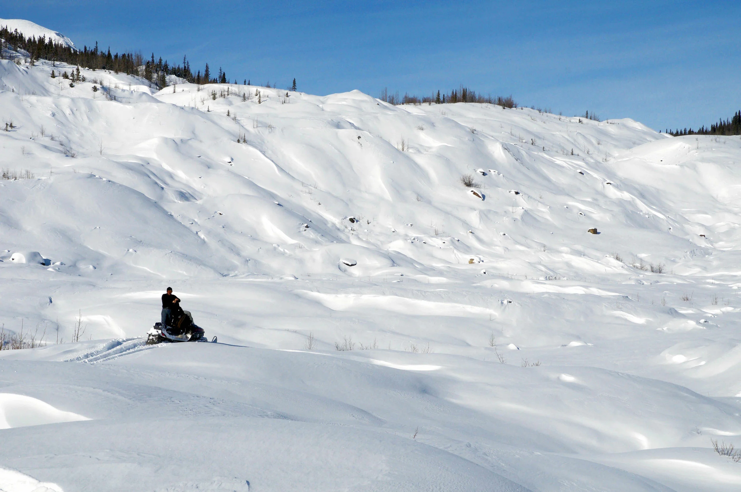 Snow machining on the west side of the Kennicott Glacier. Photo credit: Ian Gyori