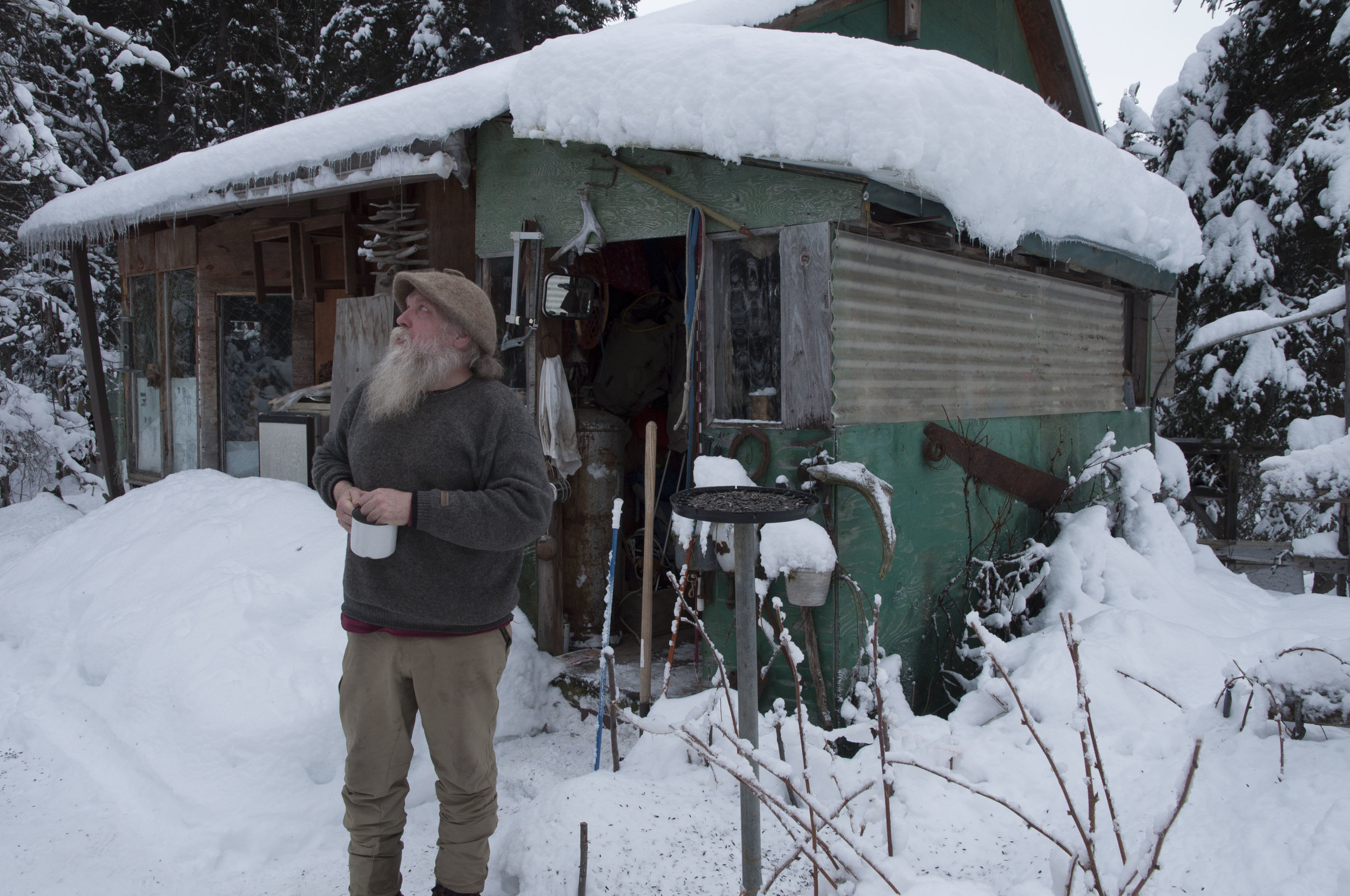 Mark Vail outside his cabin