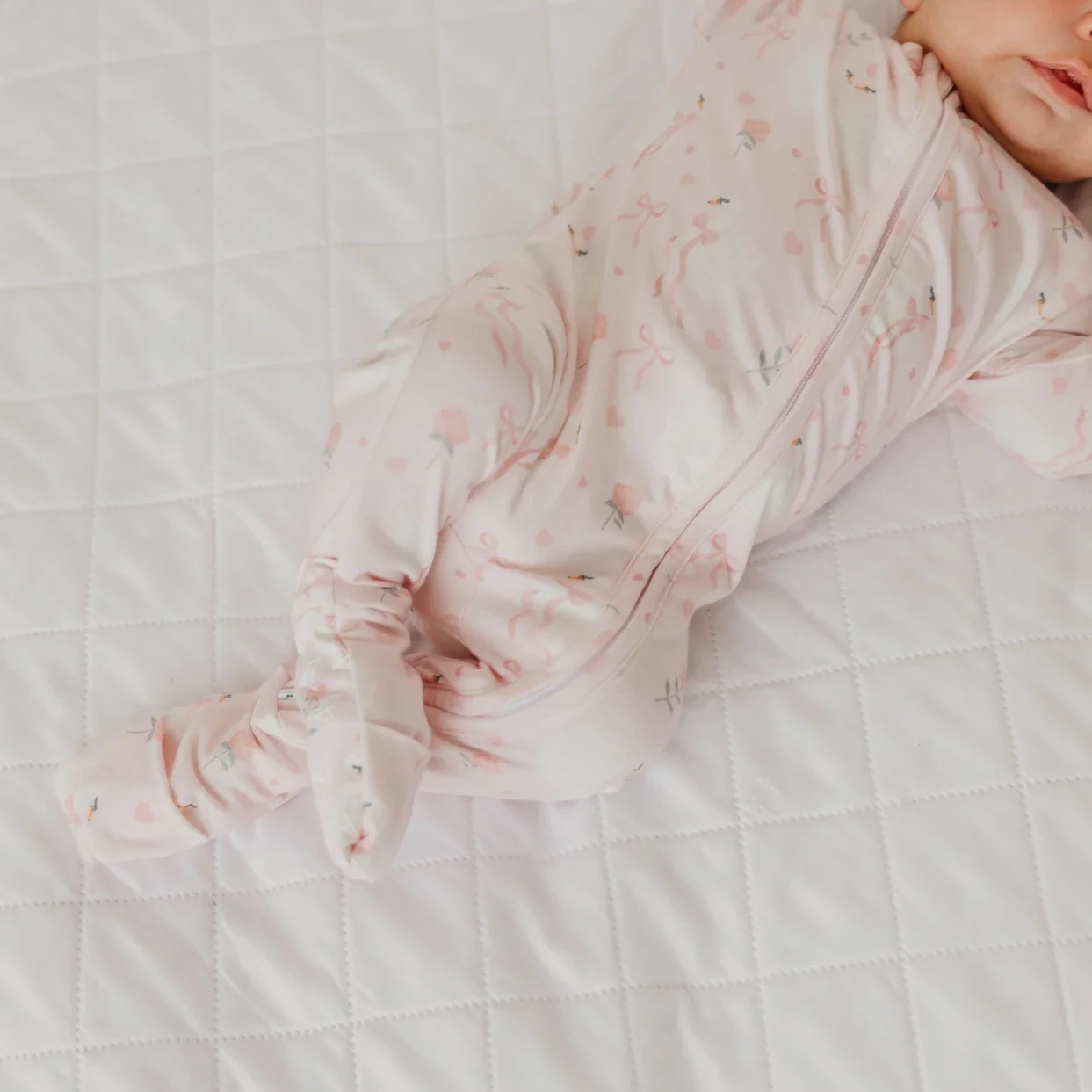 footie-copper-pearl-pink-ribbons-baby-3.webp