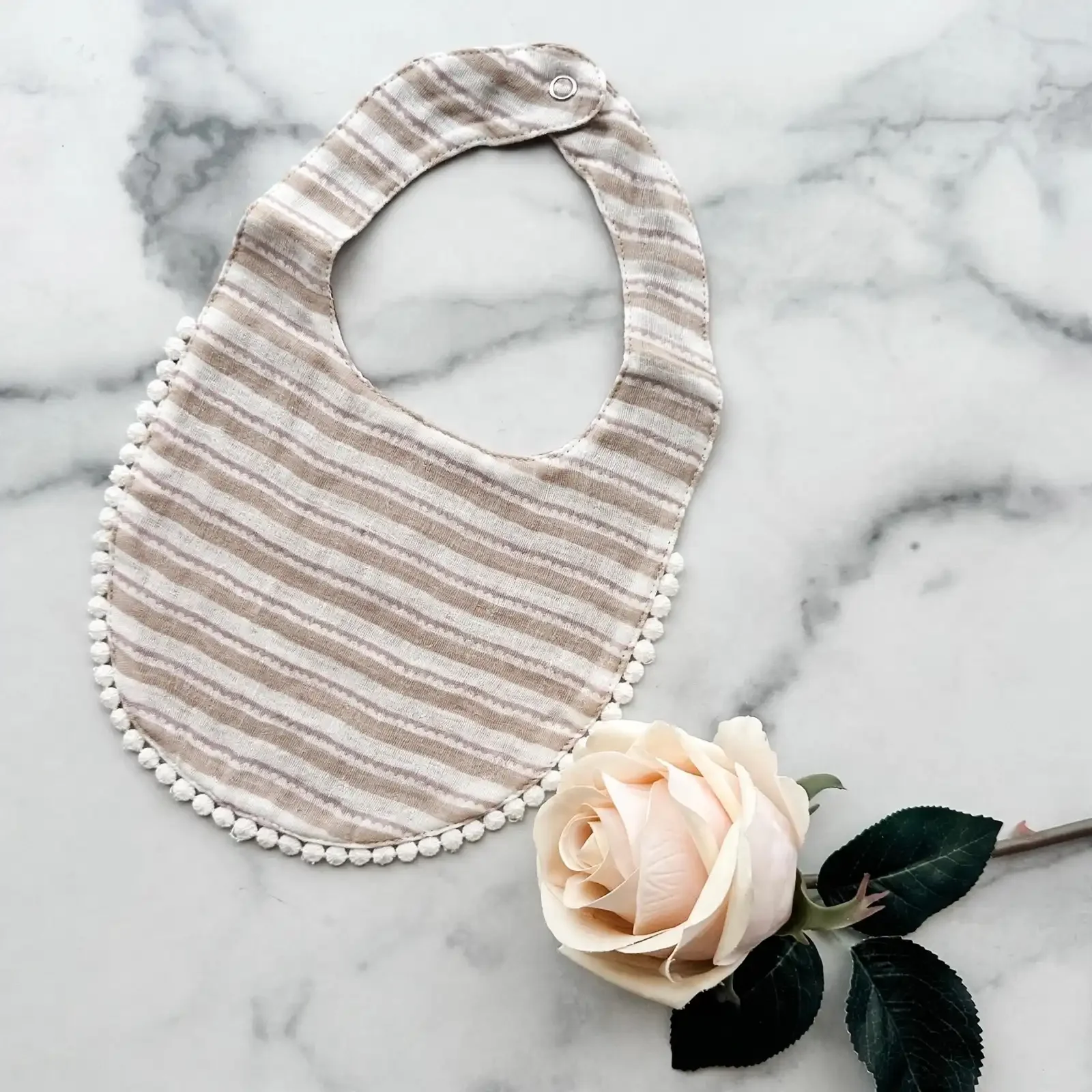 bib-pink-white-stripe.webp