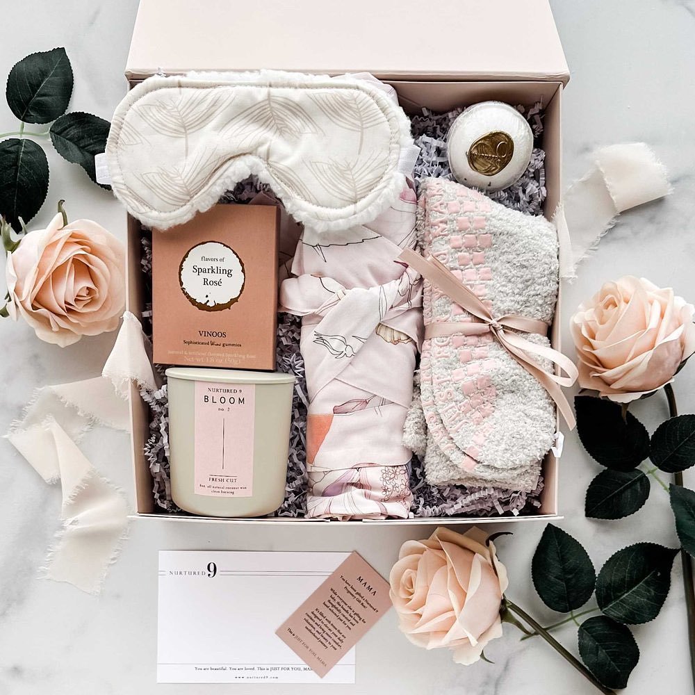 Our special edition Mother&rsquo;s Day Gift Box has arrived! 
⠀⠀⠀⠀⠀⠀⠀⠀⠀
A luxurious floral robe, plush socks, a sherpa-lined sleep mask, a lightly scented non-toxic candle, sparkling wine gummies, and an all-natural bath bomb create one jam-packed pr