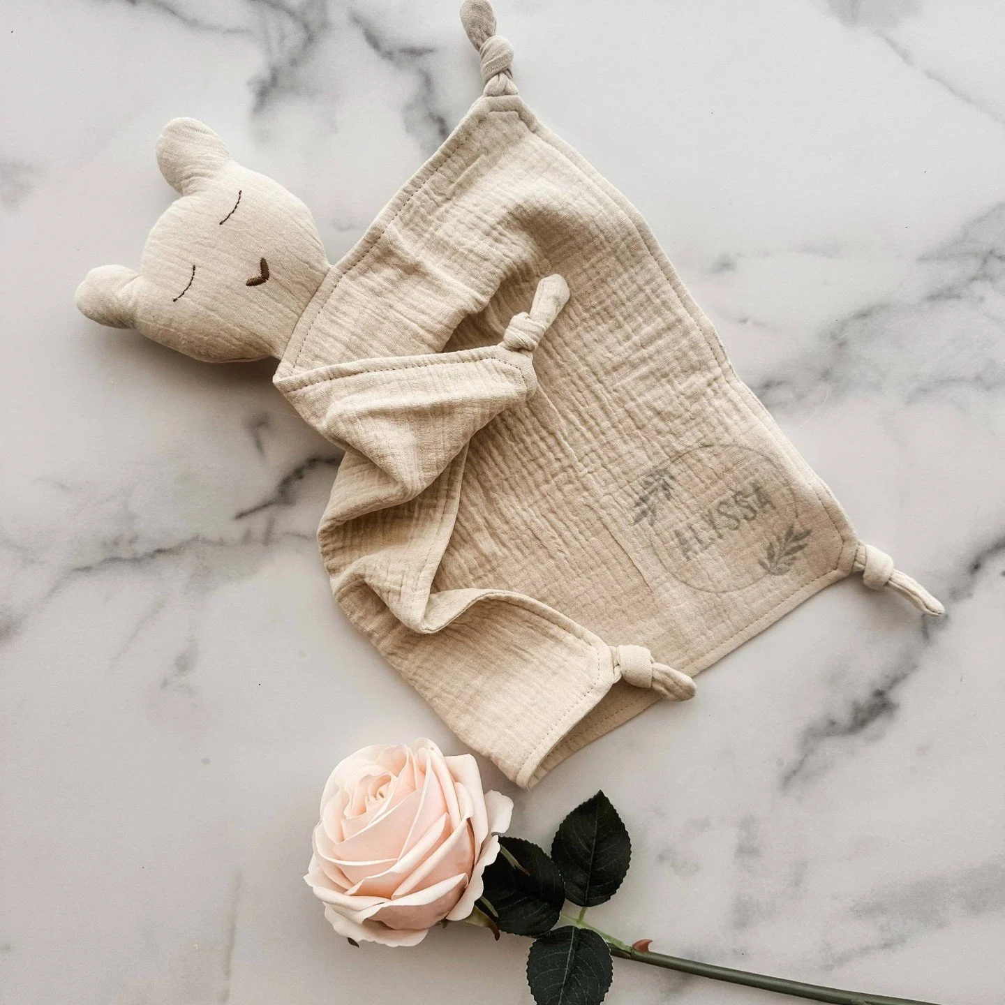 Everyone loves a personalized gift! For an extra special touch, add baby's name to our soft, cuddly, sleepy bear lovey, and include it in your next gift box for a new Mom.