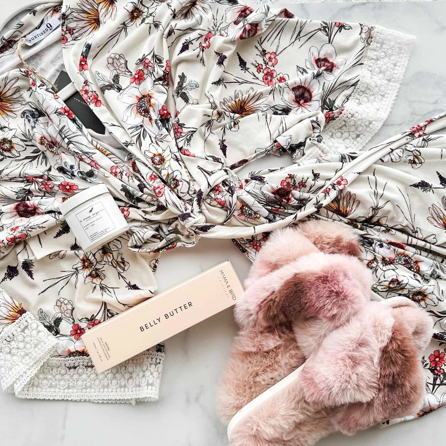 Pregnancy gifts don't have to be all about baby! What should you give instead? A soft &amp; flowy maternity robe, plush slippers, soothing belly butter, and a jar of magnesium sleepy lotion will always be at the top of our list. 

But then again...we