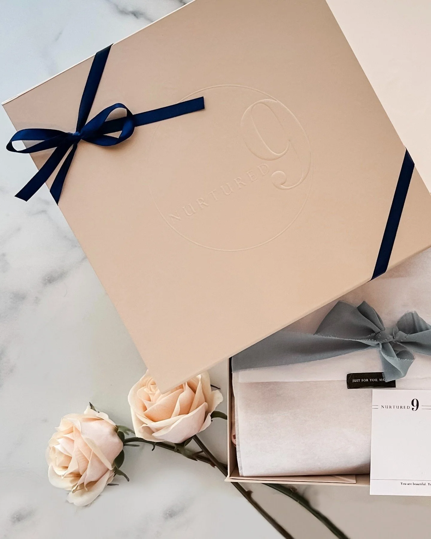 Navy or blush? Box or caddy? Add a topper or keep it simple? When you curate-your-own Nurtured 9 gift box for Mom, you get to choose exactly what goes into your gift and how it's packaged! The result is a thoughtful present that's perfectly designed 