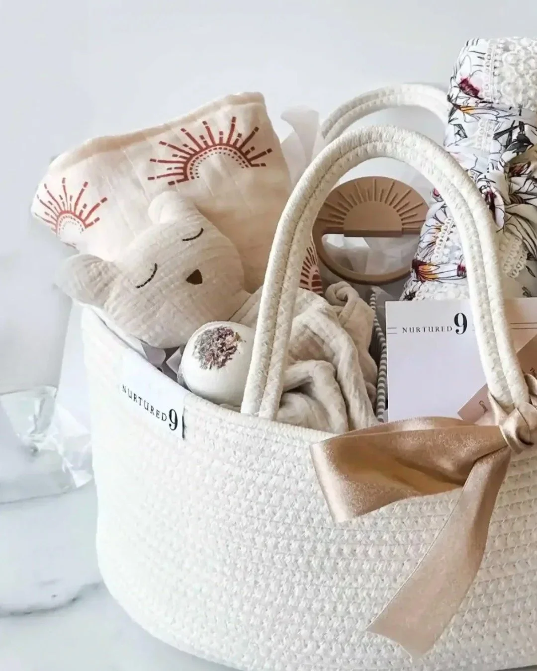 The Nurtured 9 Mom &amp; Baby Care Package combines a few gifts for baby with a few gifts for Mom, making it one of our all-time bestsellers. Find it at Nurtured9.com.