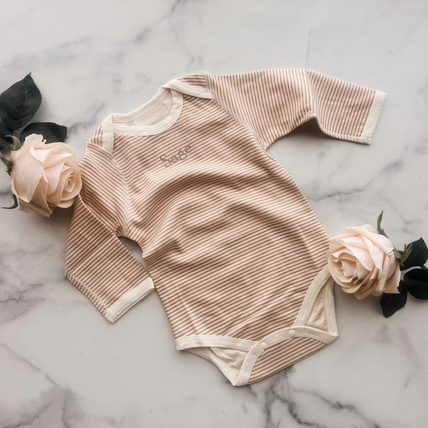 A personalized onesie is a great way to make your new baby gift even more memorable! Add baby's name or your company's logo to a onesie at Nurtured 9. We'll bundle it up with your other gift items, add our signature gift wrap, and send it on its way 