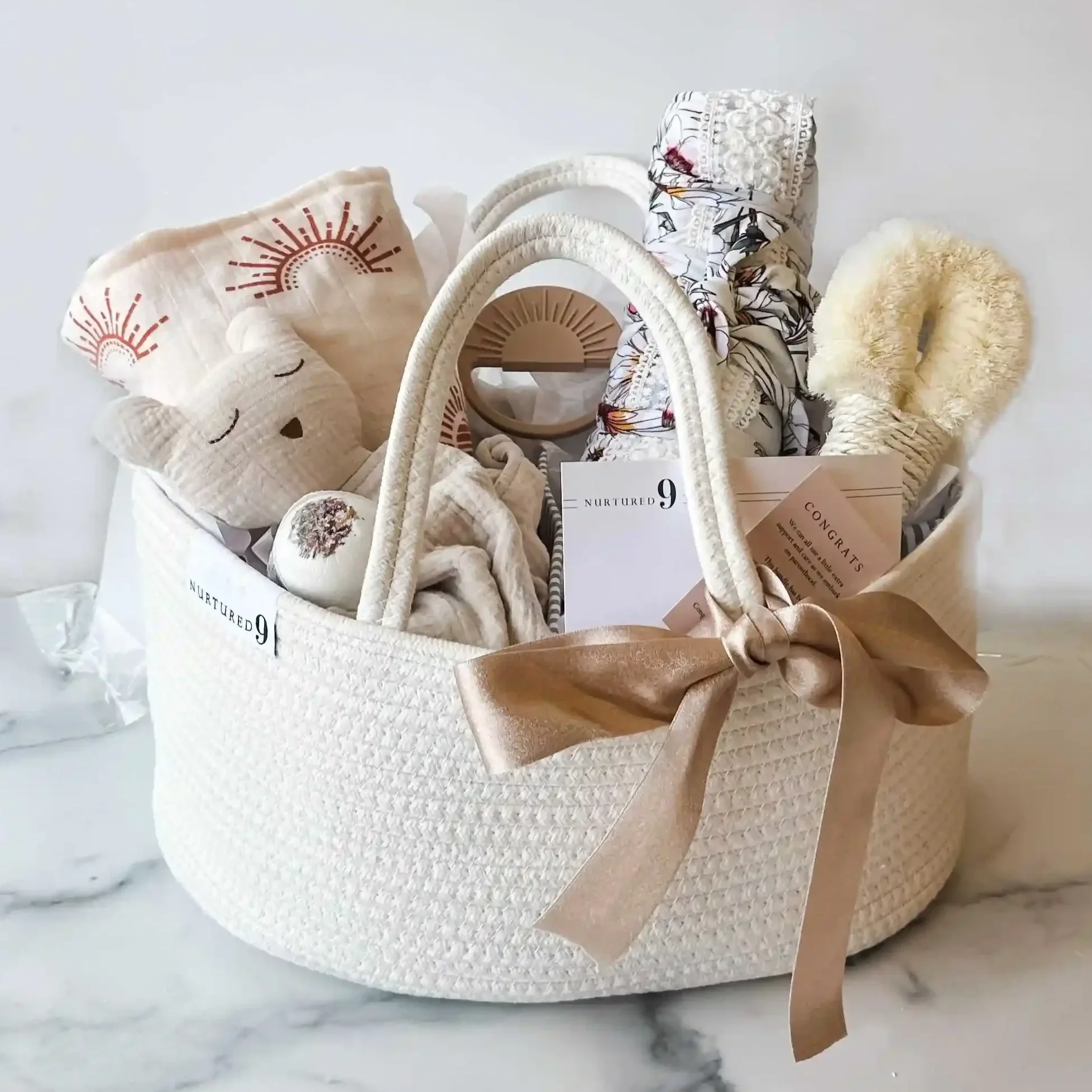 mom and baby care package with gifts for a new mom and a newborn