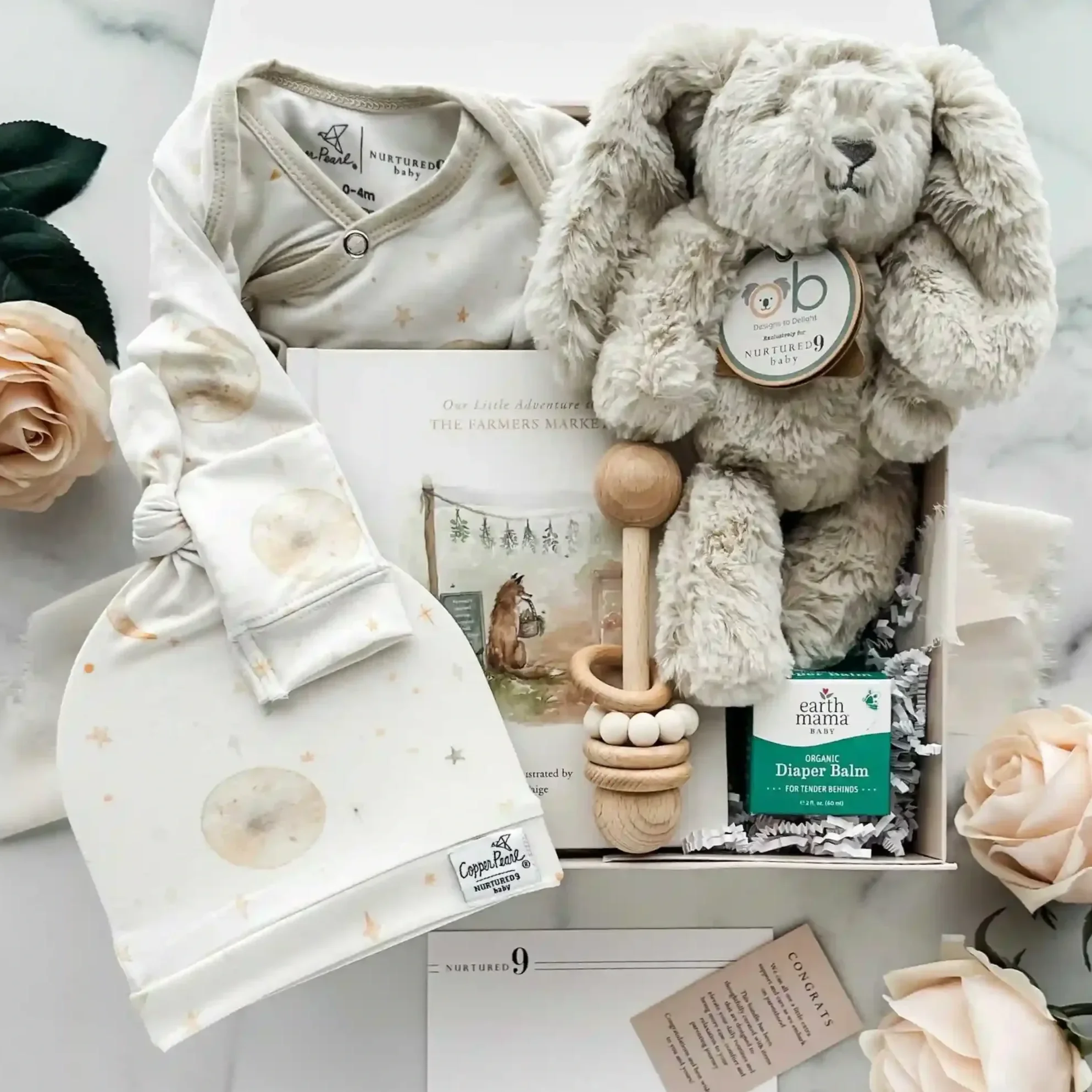New family gift box with items for new parents and baby