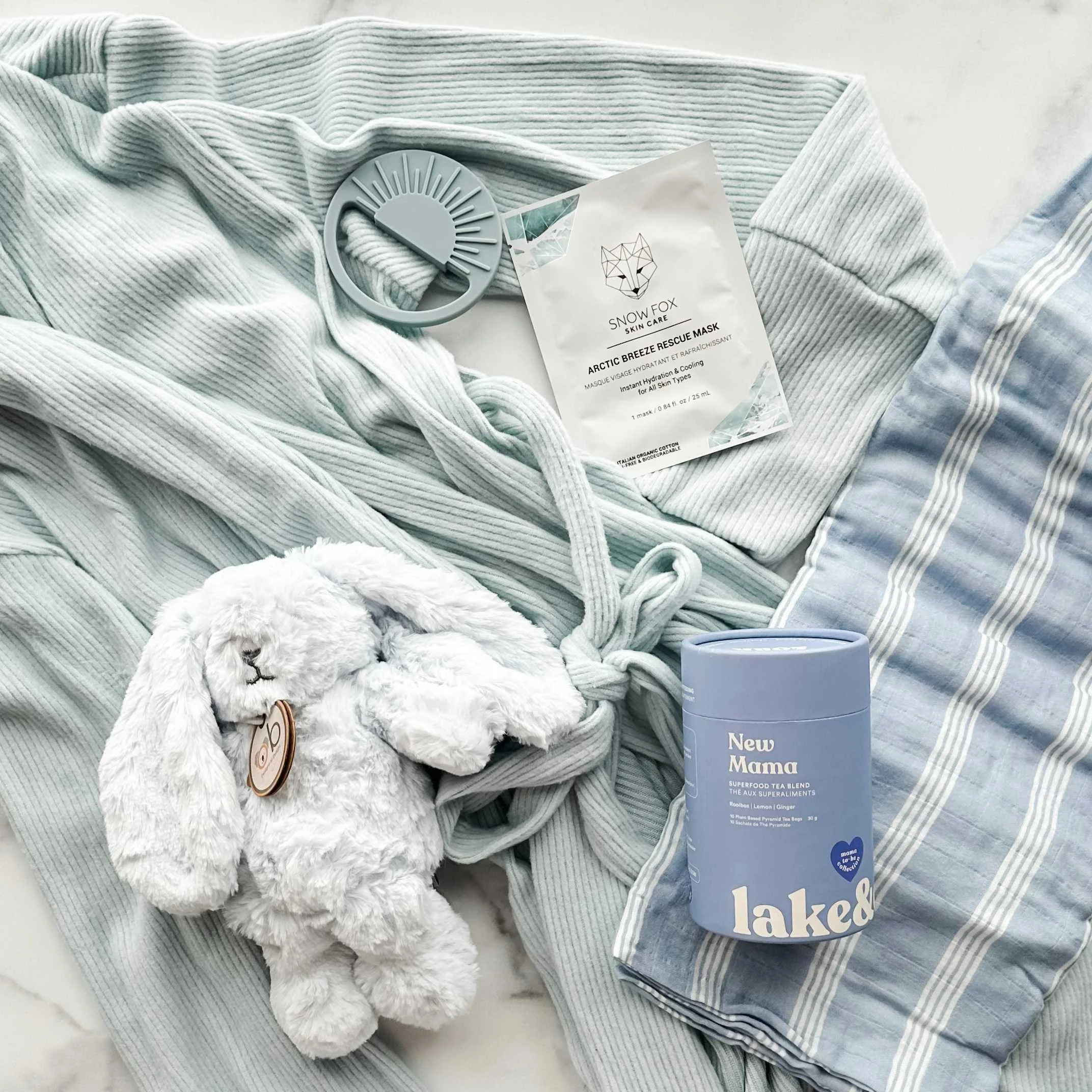 baby-boy-and-mom-blue-stripe-flatlay.jpg