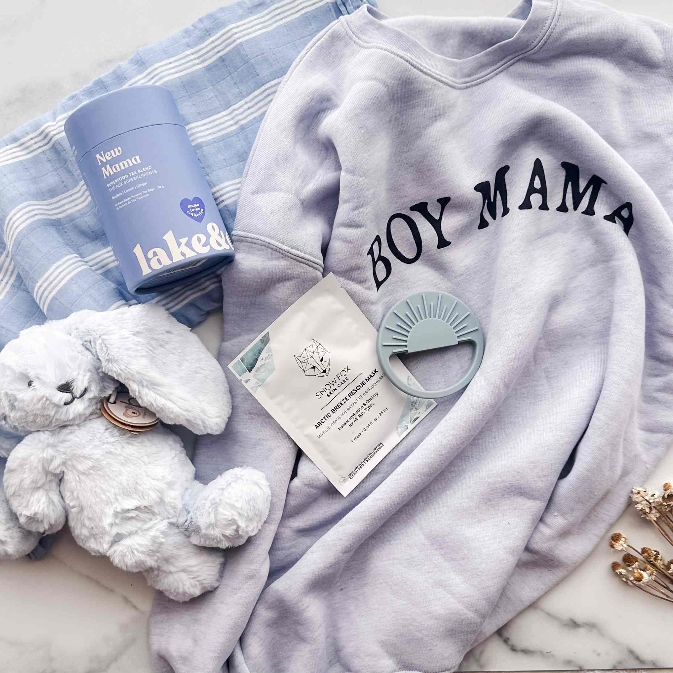baby-boy-and-mom-blue-sweatshirt-flatlay.jpg