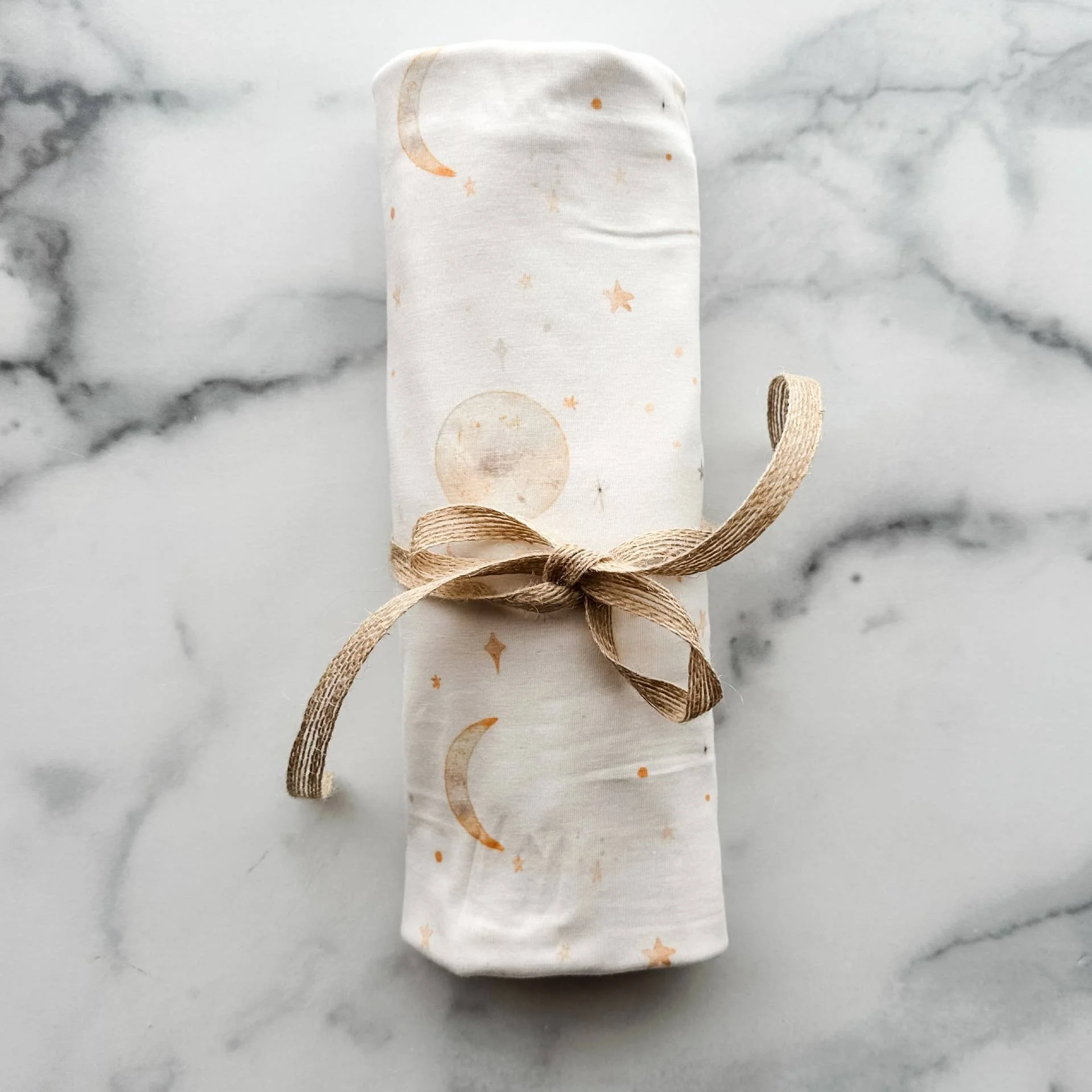 Copper Pearl X Nurtured 9 Moon Swaddle Blanket