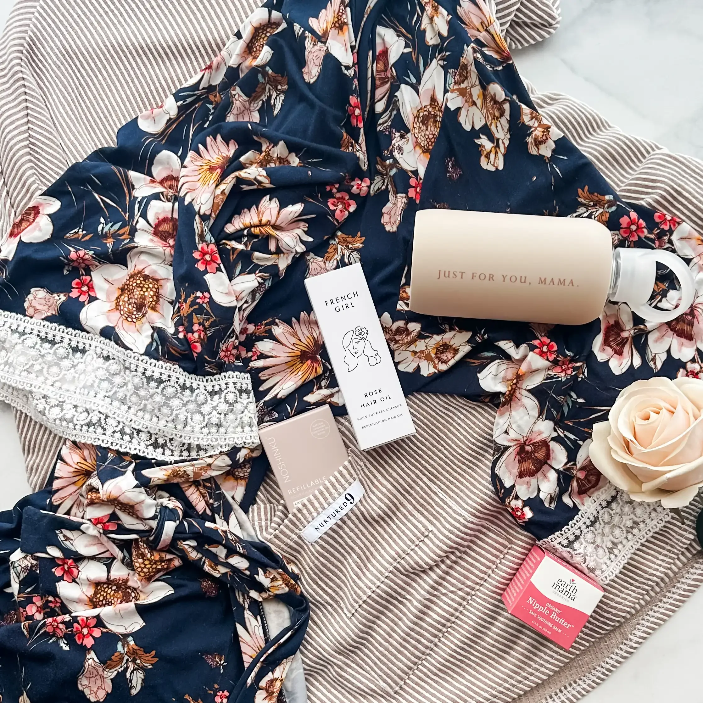 replenish-and-restore-new-mom-gift-box-for-postpartum-navy-flatlay.webp