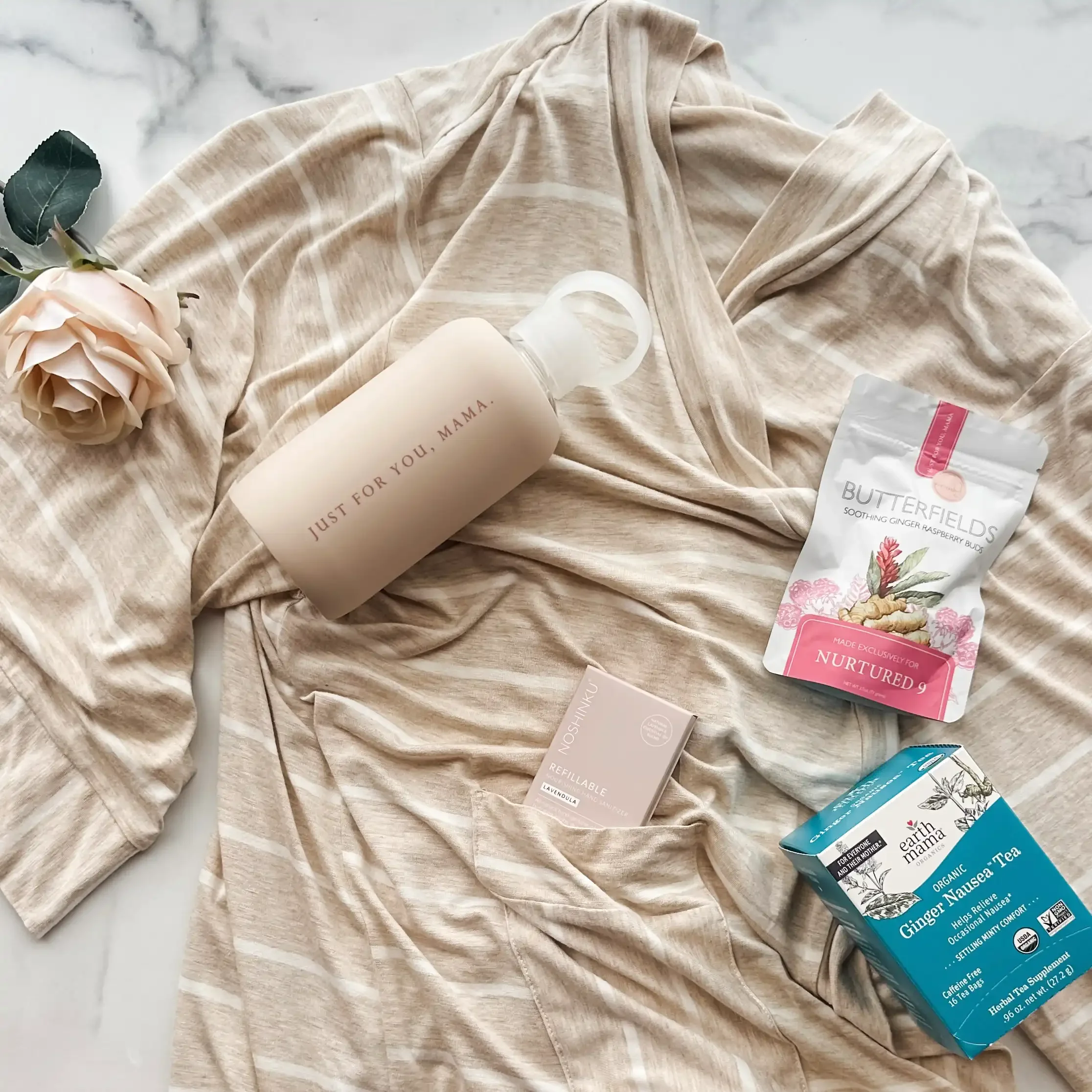congrats-pregnancy-gift box-stripe-flatlay.webp