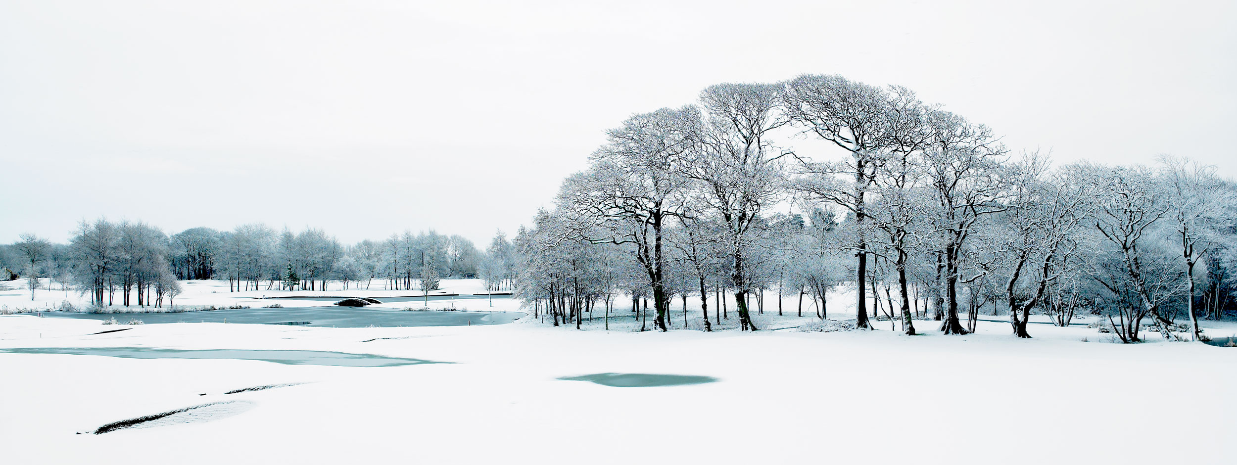 Snow-covered golf course at Formby Hall, UK.  Golf course photography by Mike Caldwell