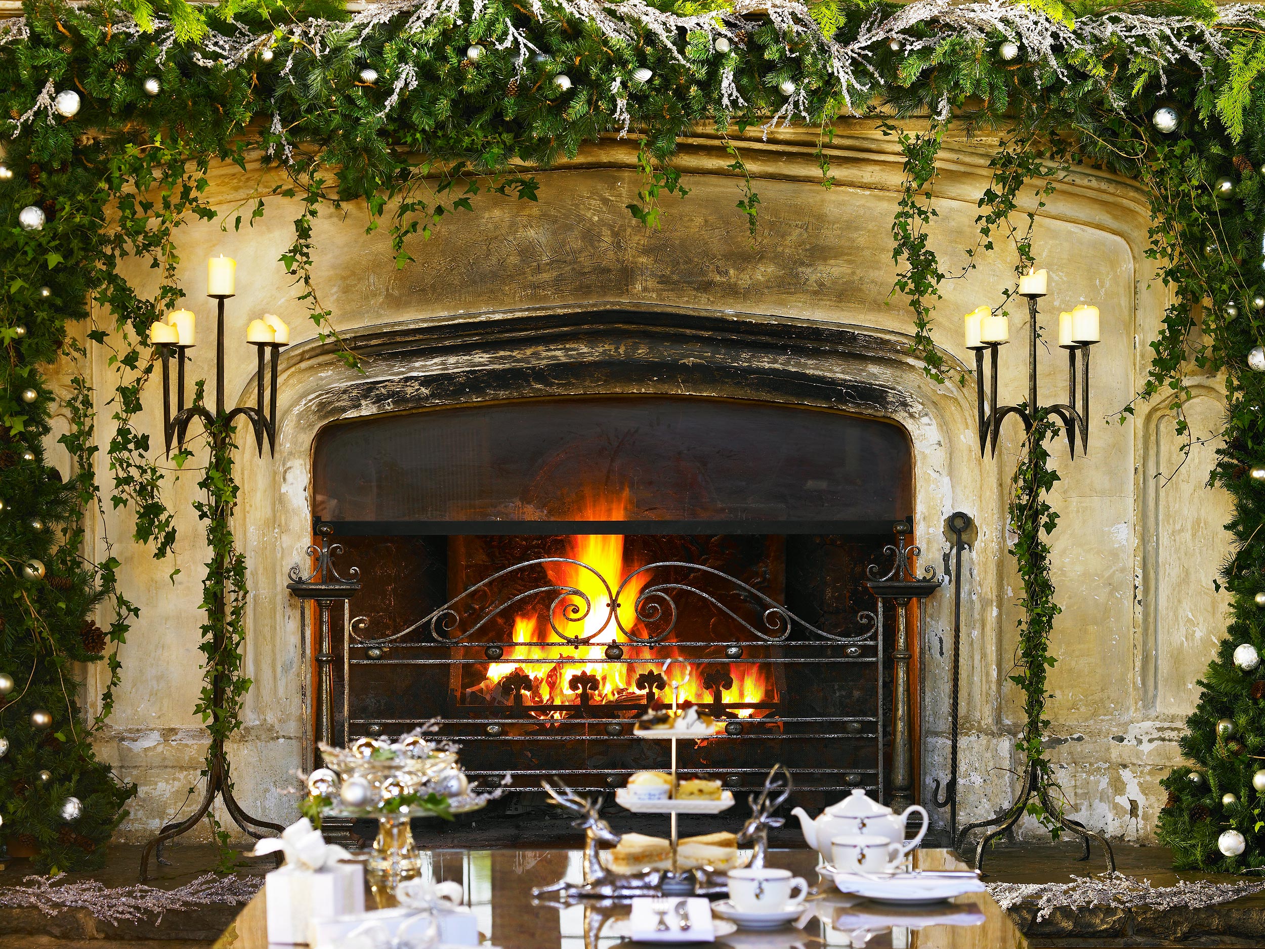 The fireplace at Fawsley Hall hotel & spa, Northamptonshire, UK.  Resort photography by Mike Caldwell